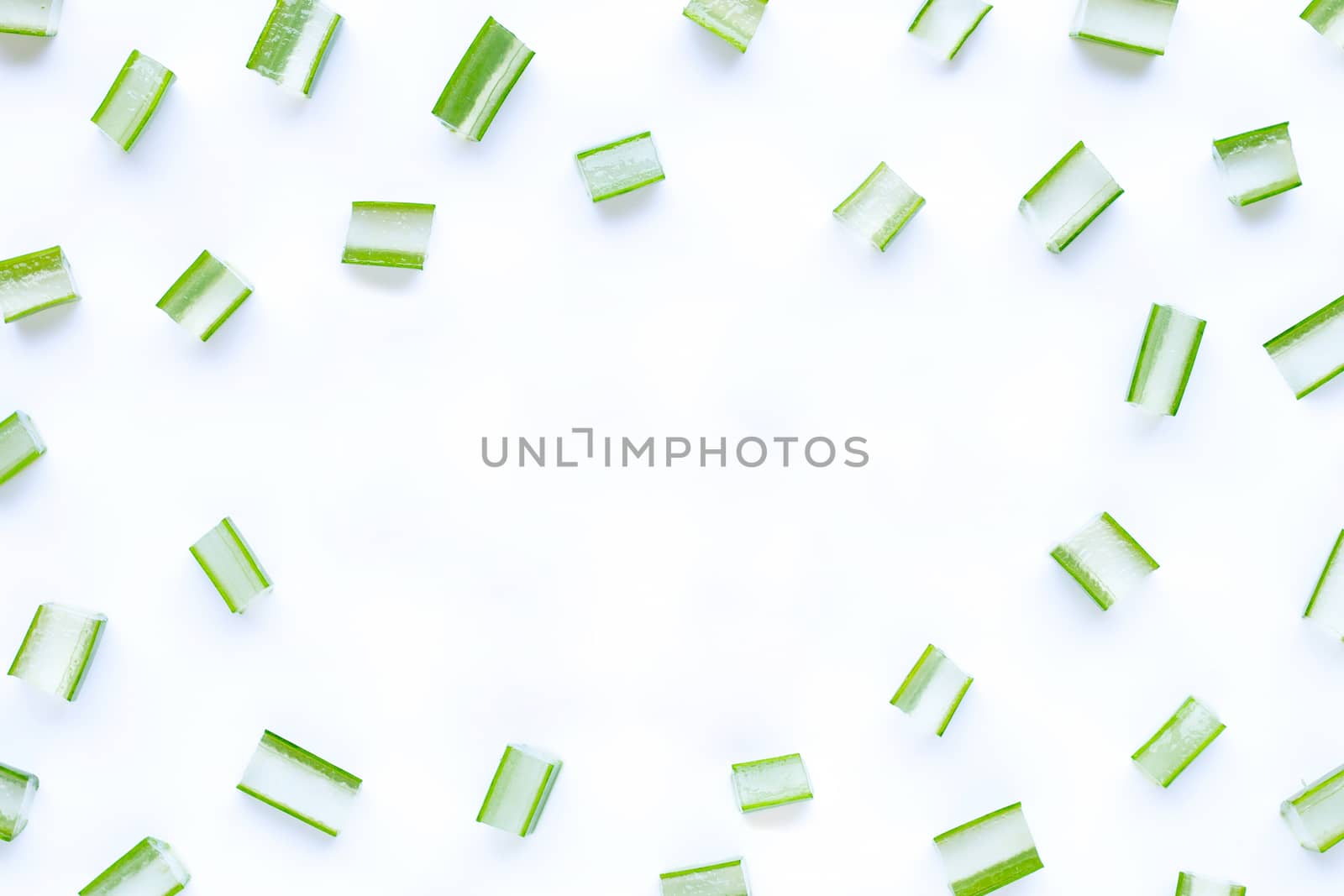 Frame made of aloe vera cut pieces  on white background. Copy space