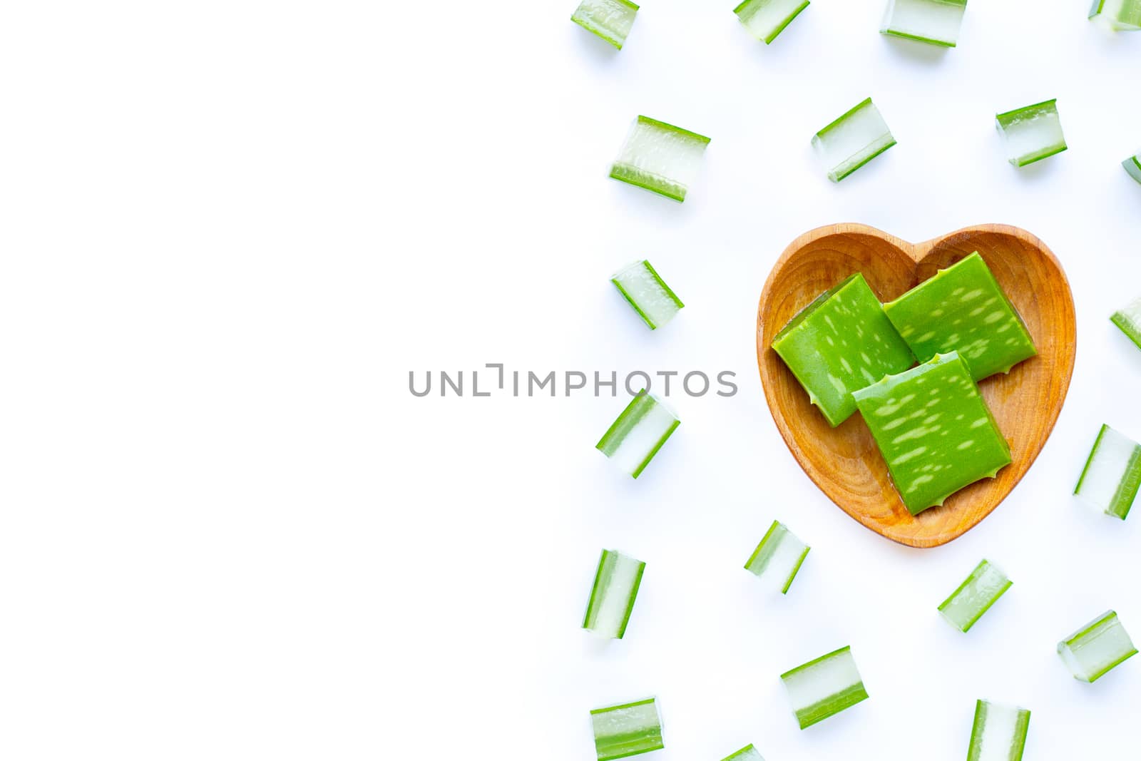 Aloe Vera cut pieces with slices on white background. Copy space