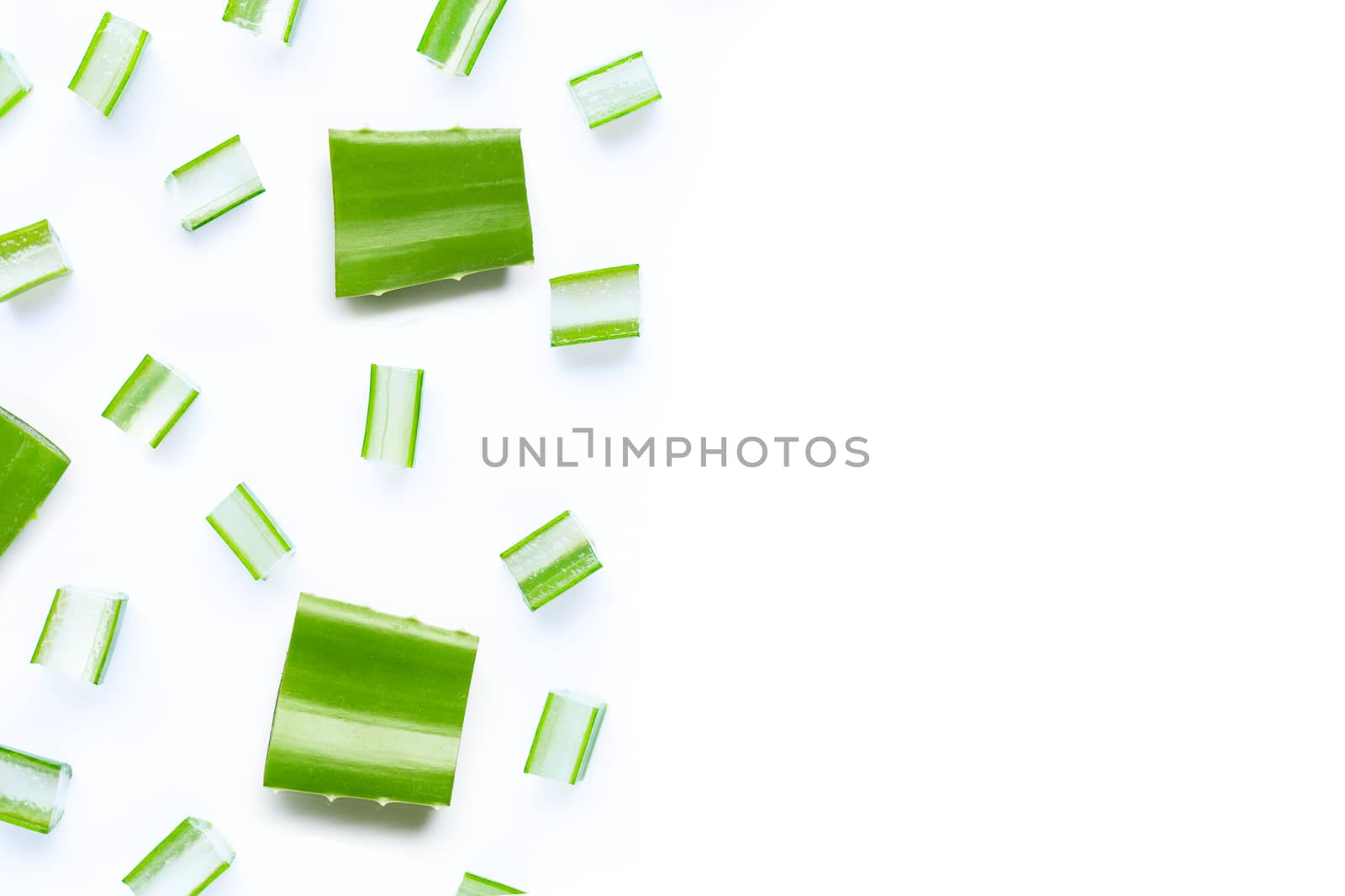 Aloe Vera cut pieces with slices on white background. Copy space