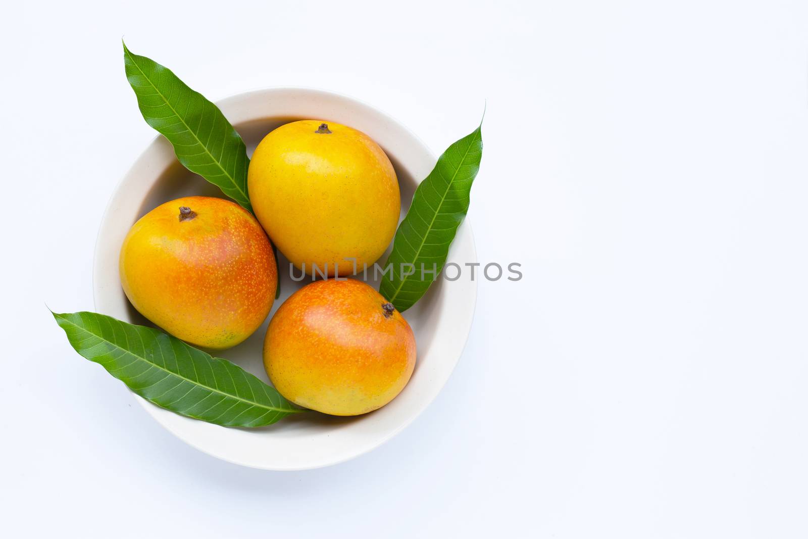 Tropical fruit, Mango  on white background. Top view
