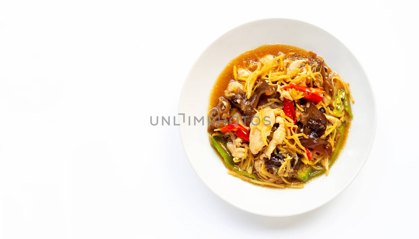 Stir fried chicken with ginger on white background.