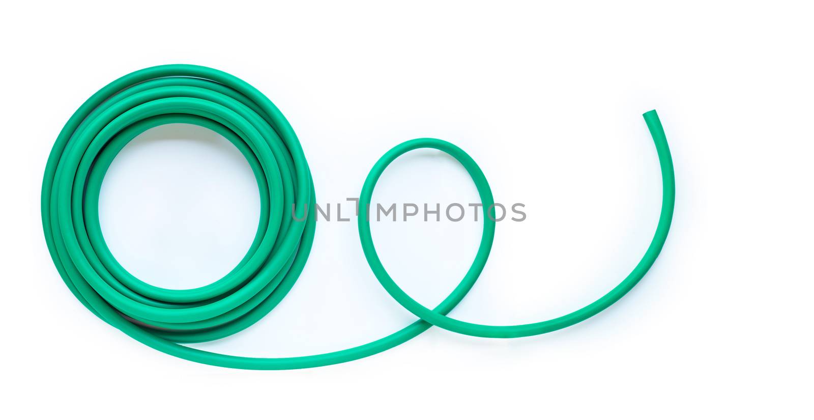 Green garden hose on white background. Copy space