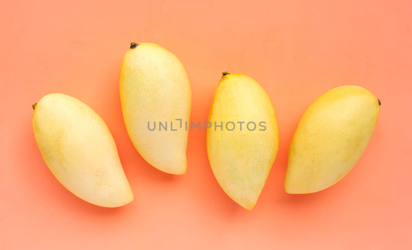 Top view of yellow mango, Tropical fruit  juicy and sweet.