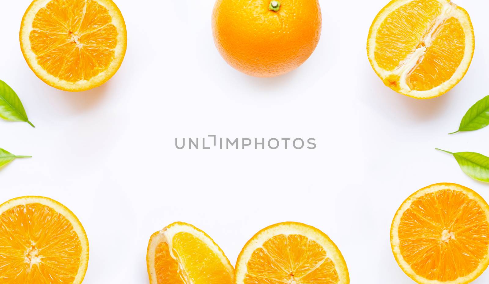 High vitamin C, Juicy and sweet. Frame made of fesh orange fruit with green leaves on white background