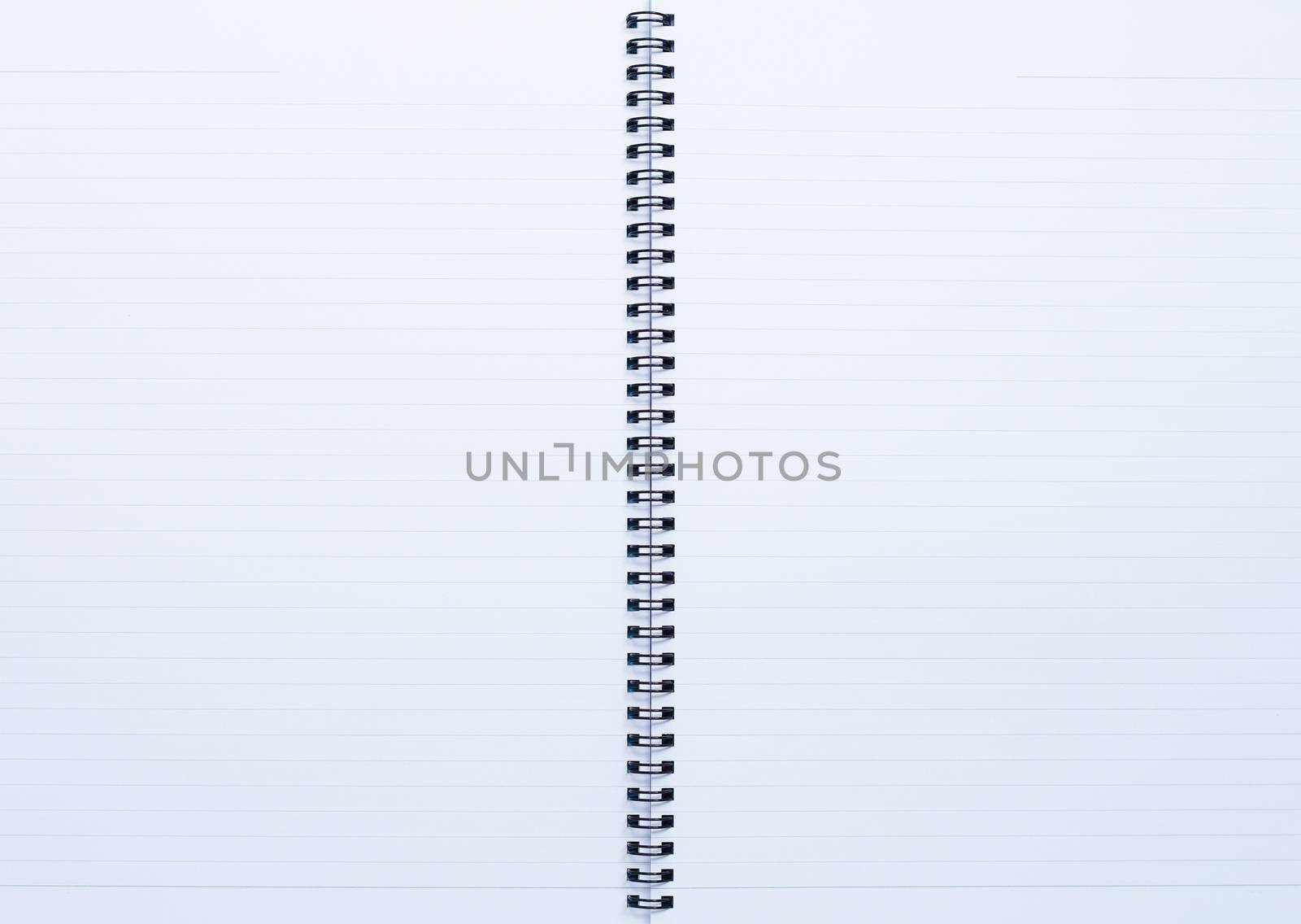 Opened notebook, Page of paper for background.