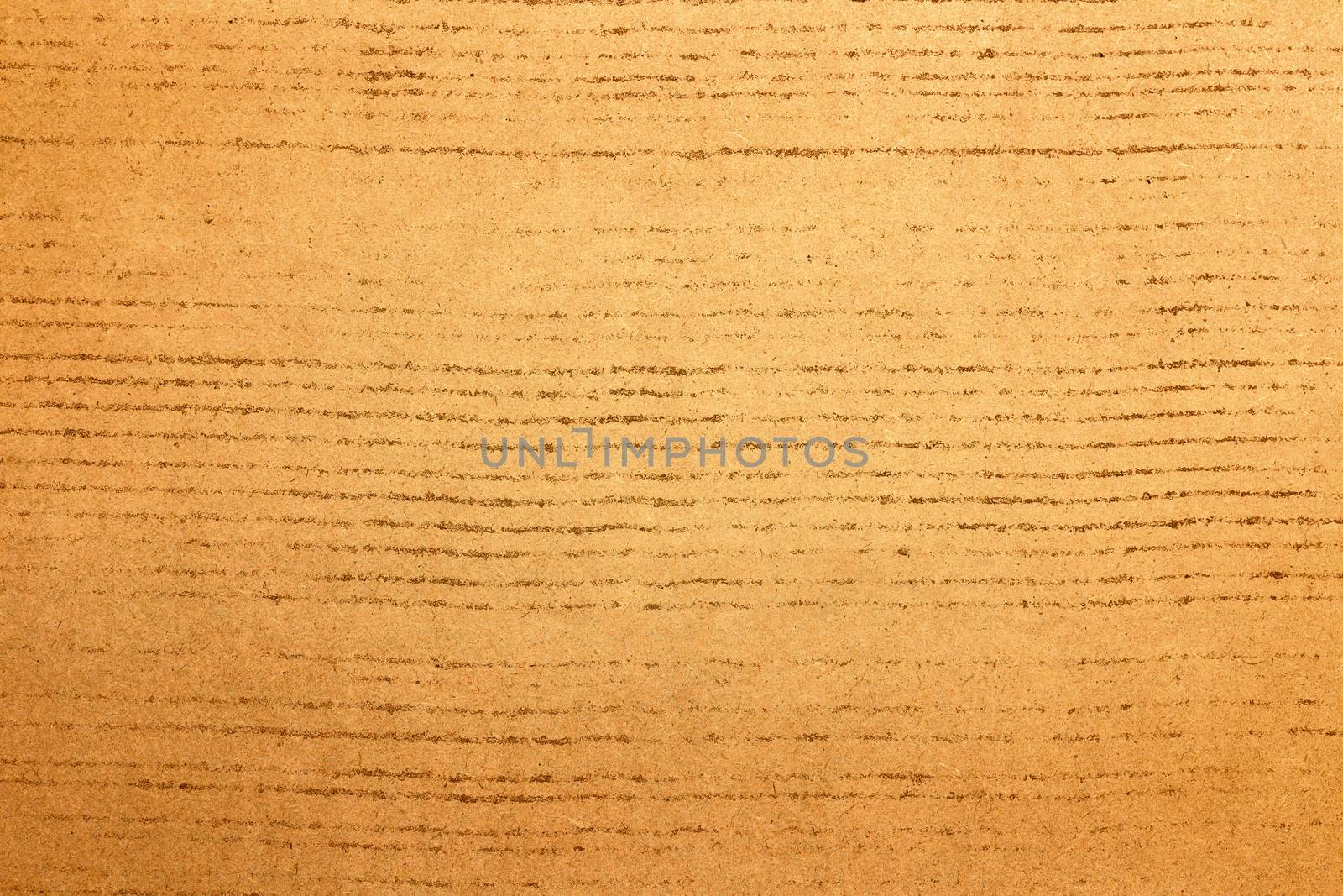 Sheet of brown paper or cardboard texture for background.
