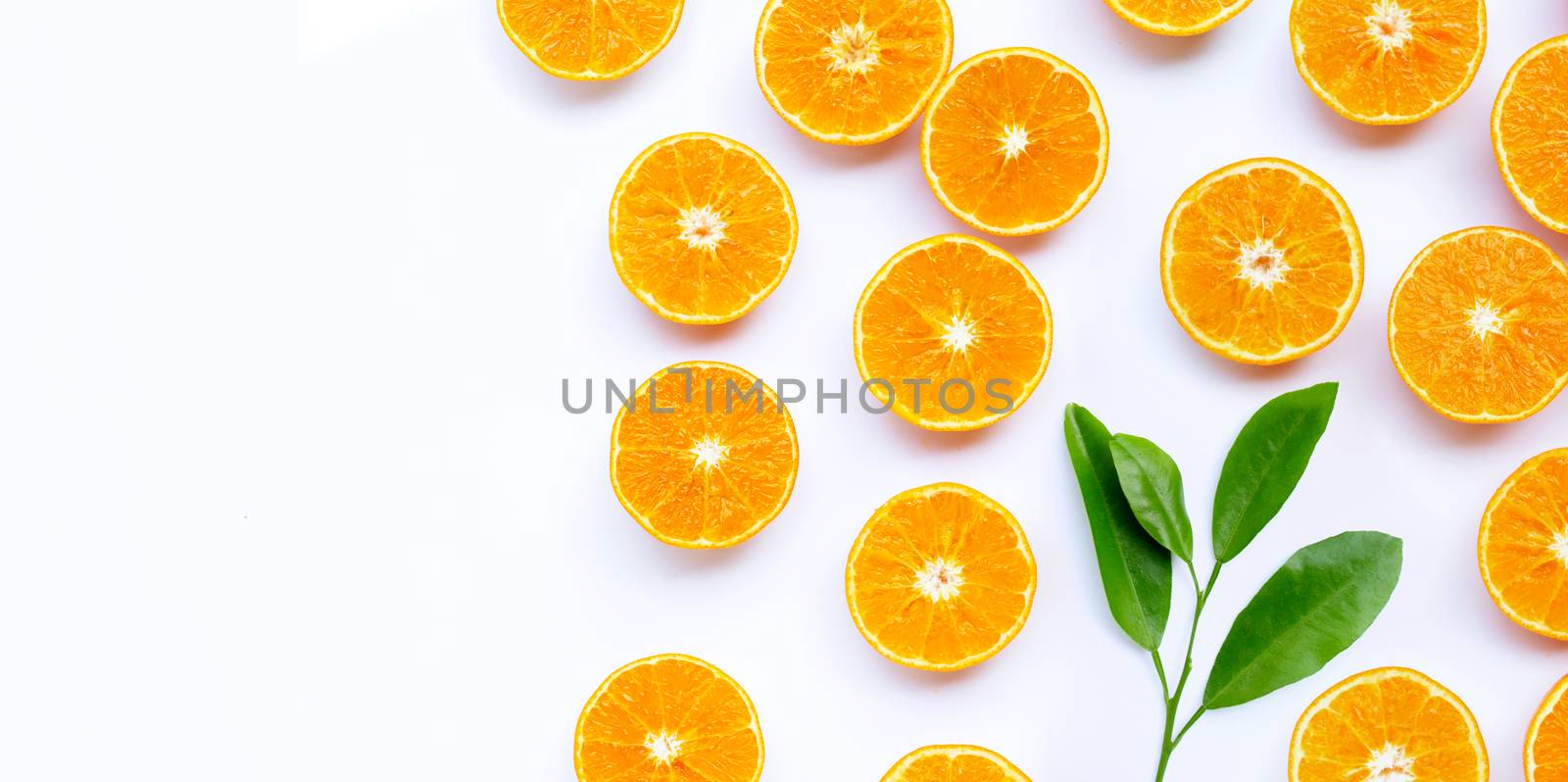 Orange fruit with leaves on white background.  by Bowonpat