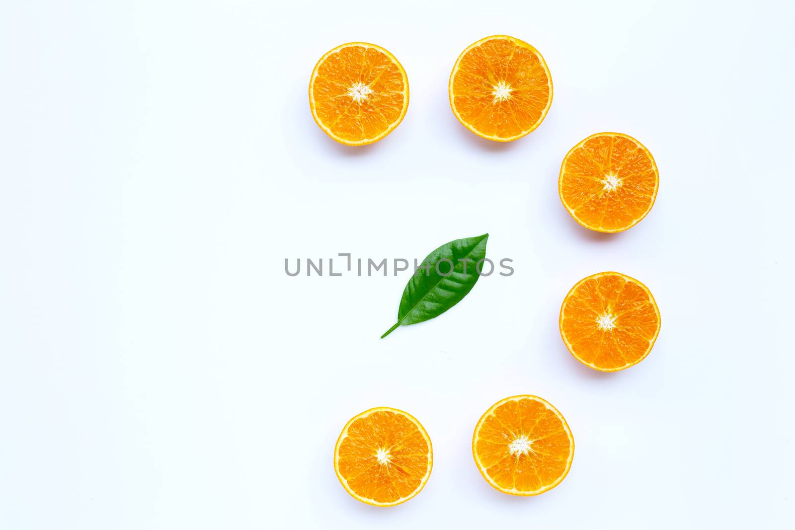 Orange fruit on white. Copy space