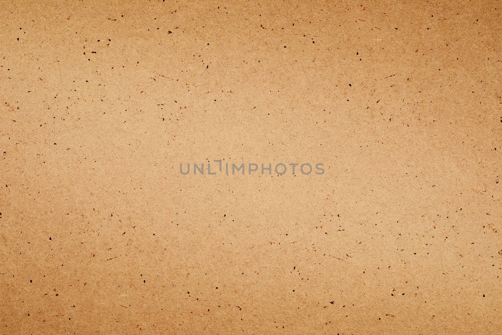 Sheet of brown paper or cardboard texture for background.