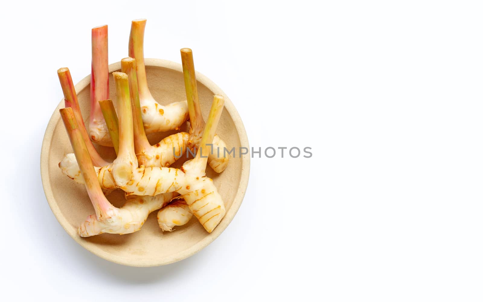 Fresh galangal isolated on white background.