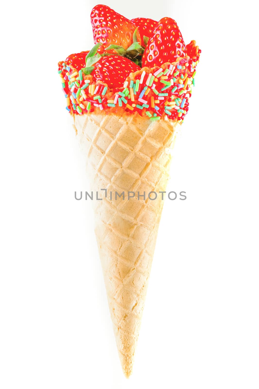 a waffle cone of fresh strawberries with colorful sugary confetti, isolated on white background