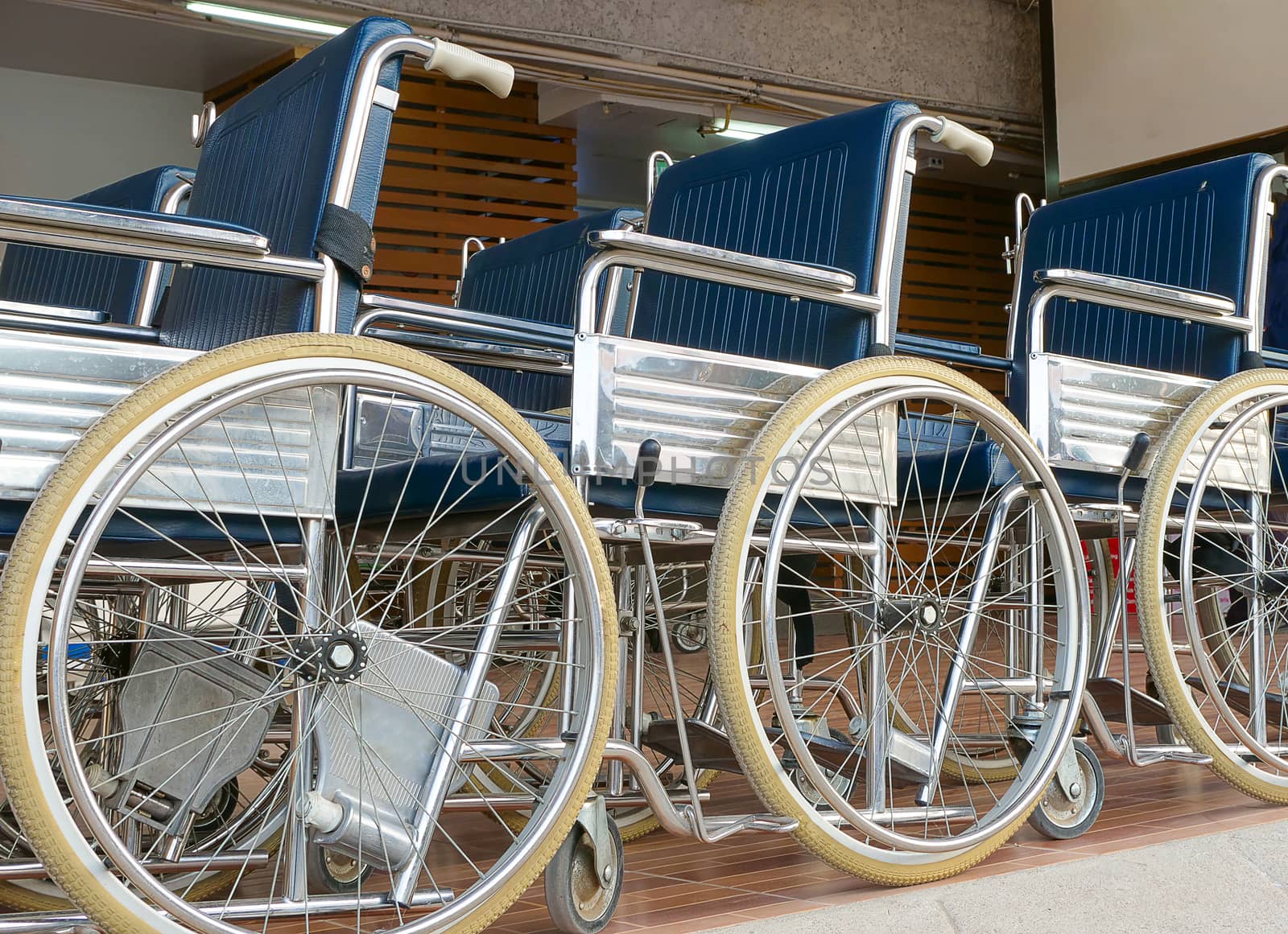 wheelchairs parking on a platform by Nawoot