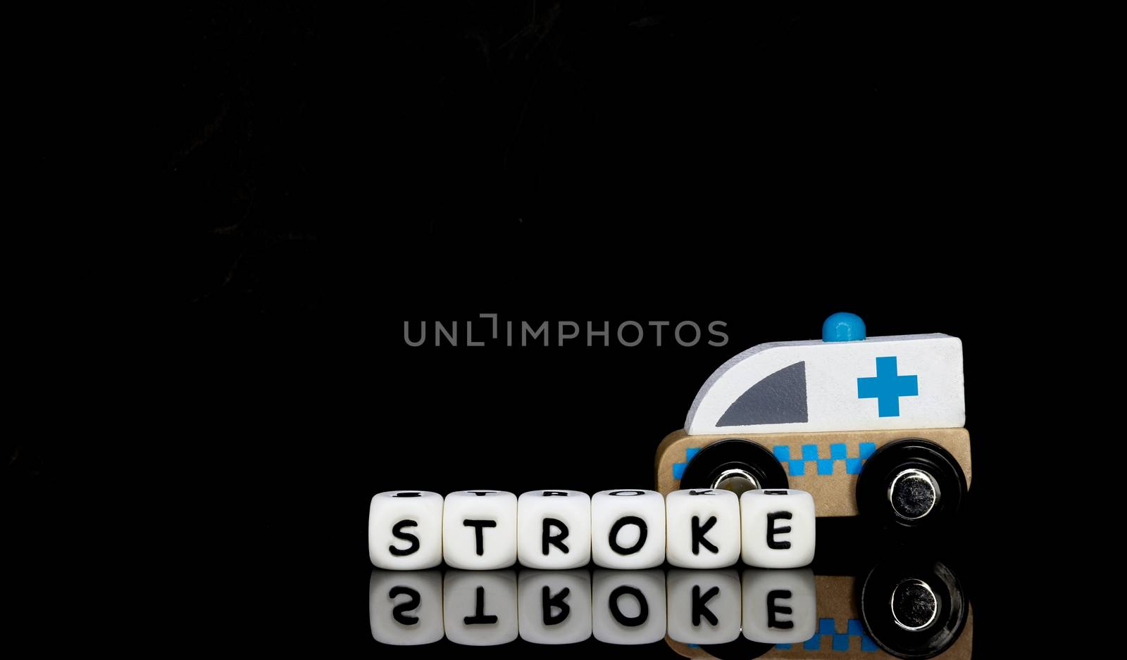 a toy ambulance and a word stroke by Nawoot