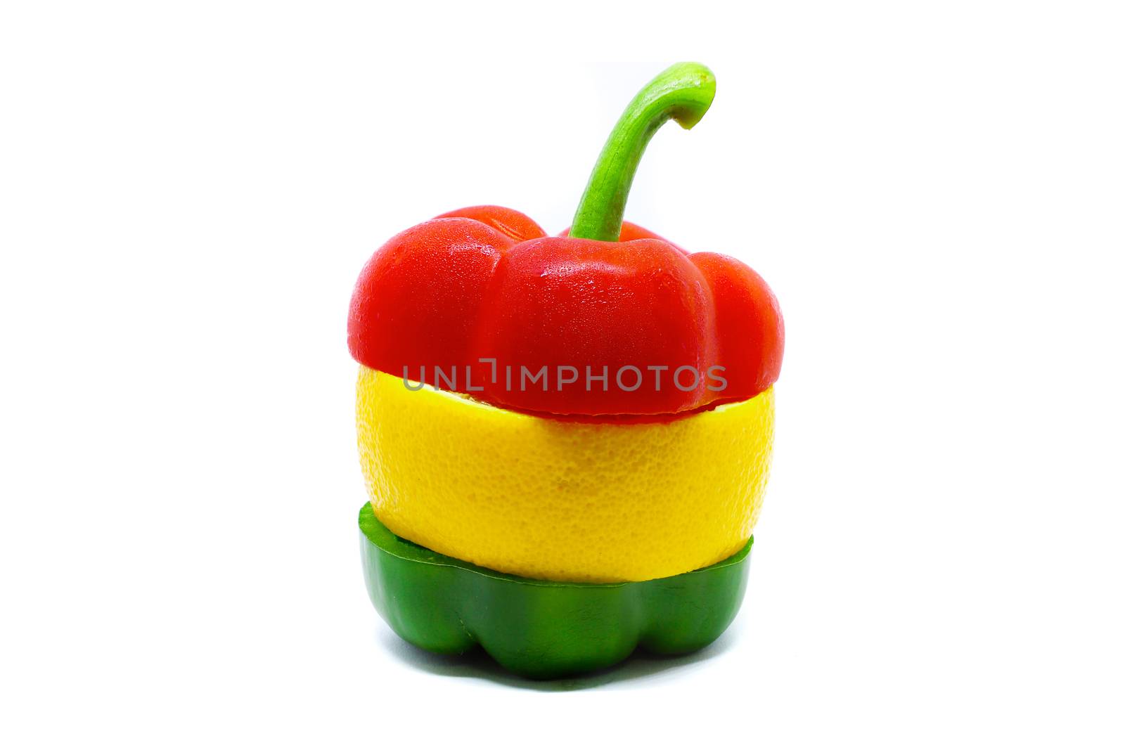 red and green bell pepper and navel orange sliced and arranged into multicolor imaginative vegetable, isolated on white background