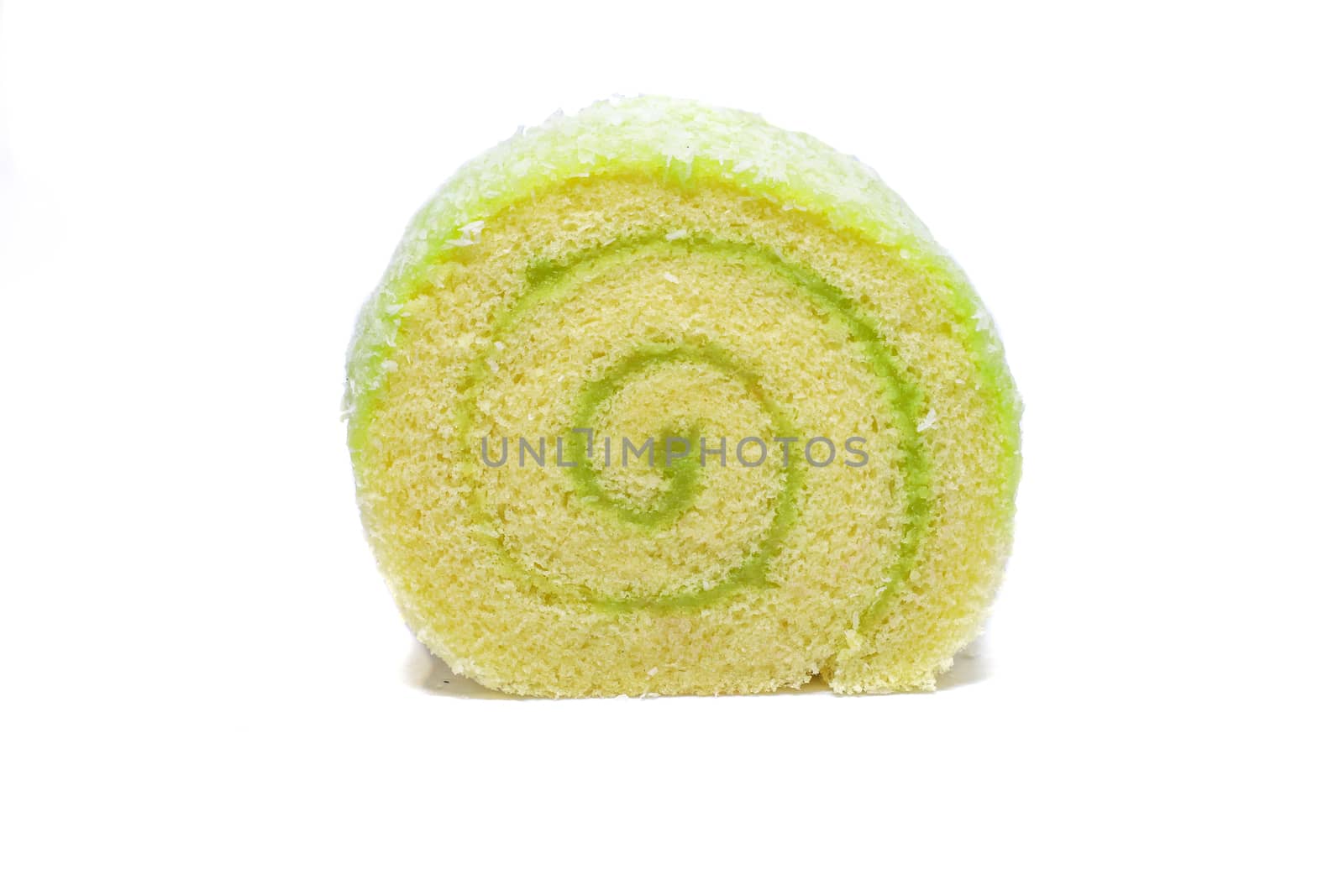 a slice of sweet roll cake with pandan filling, isolated on white background