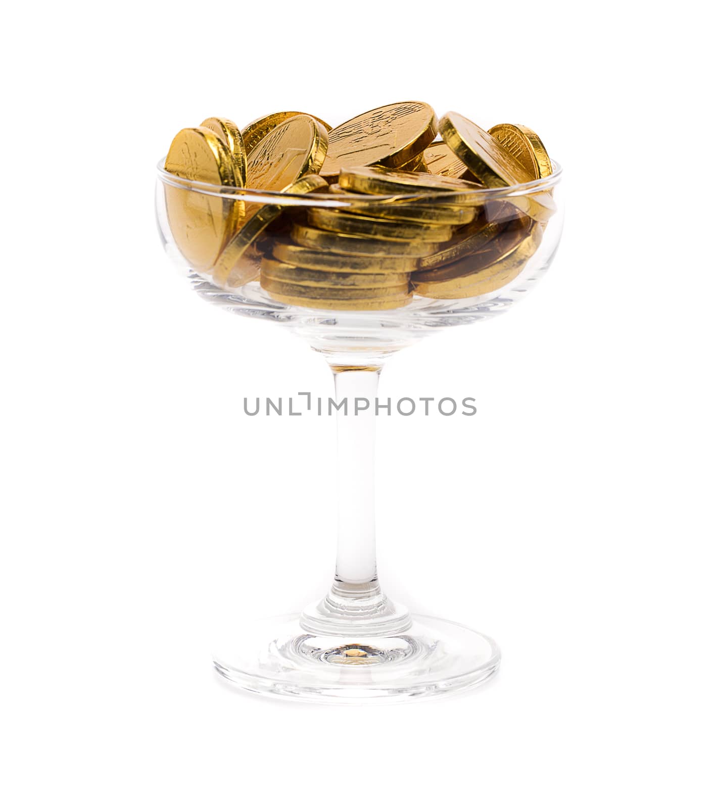 a heap of gold coins in a clear glass, isolated on white background