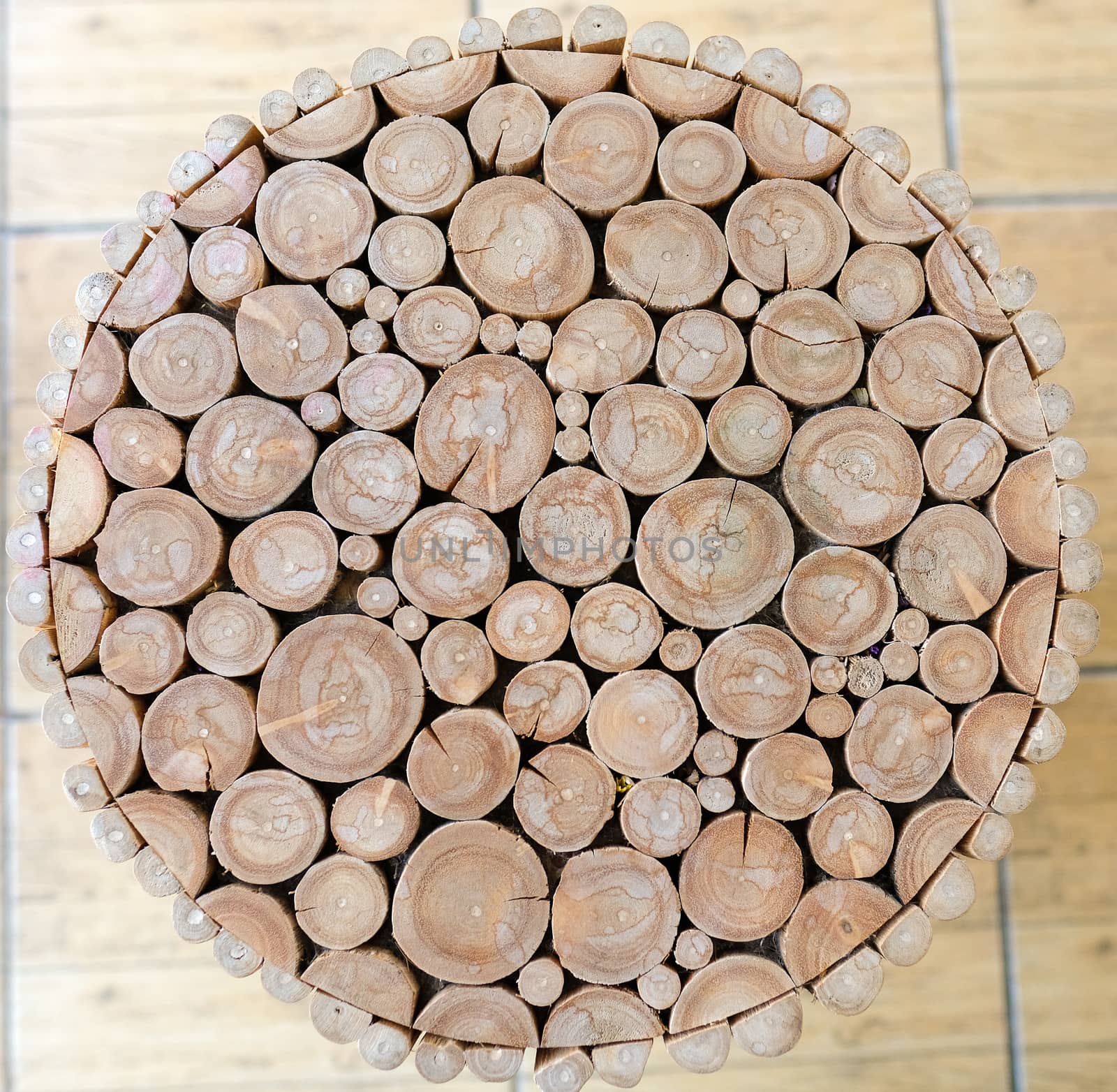 a stool made from bundle of log wood, tidy and modern looking, top view