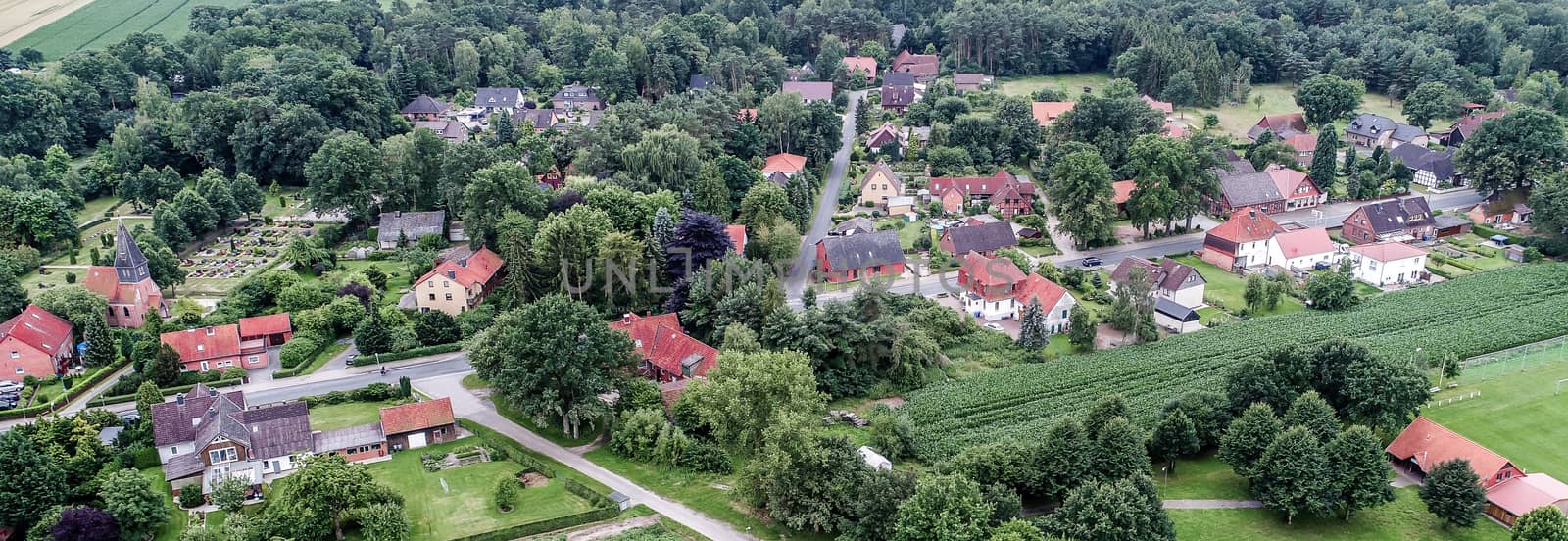 Shot from the air of a village, Ahnsen, Lower Saxony, Germany