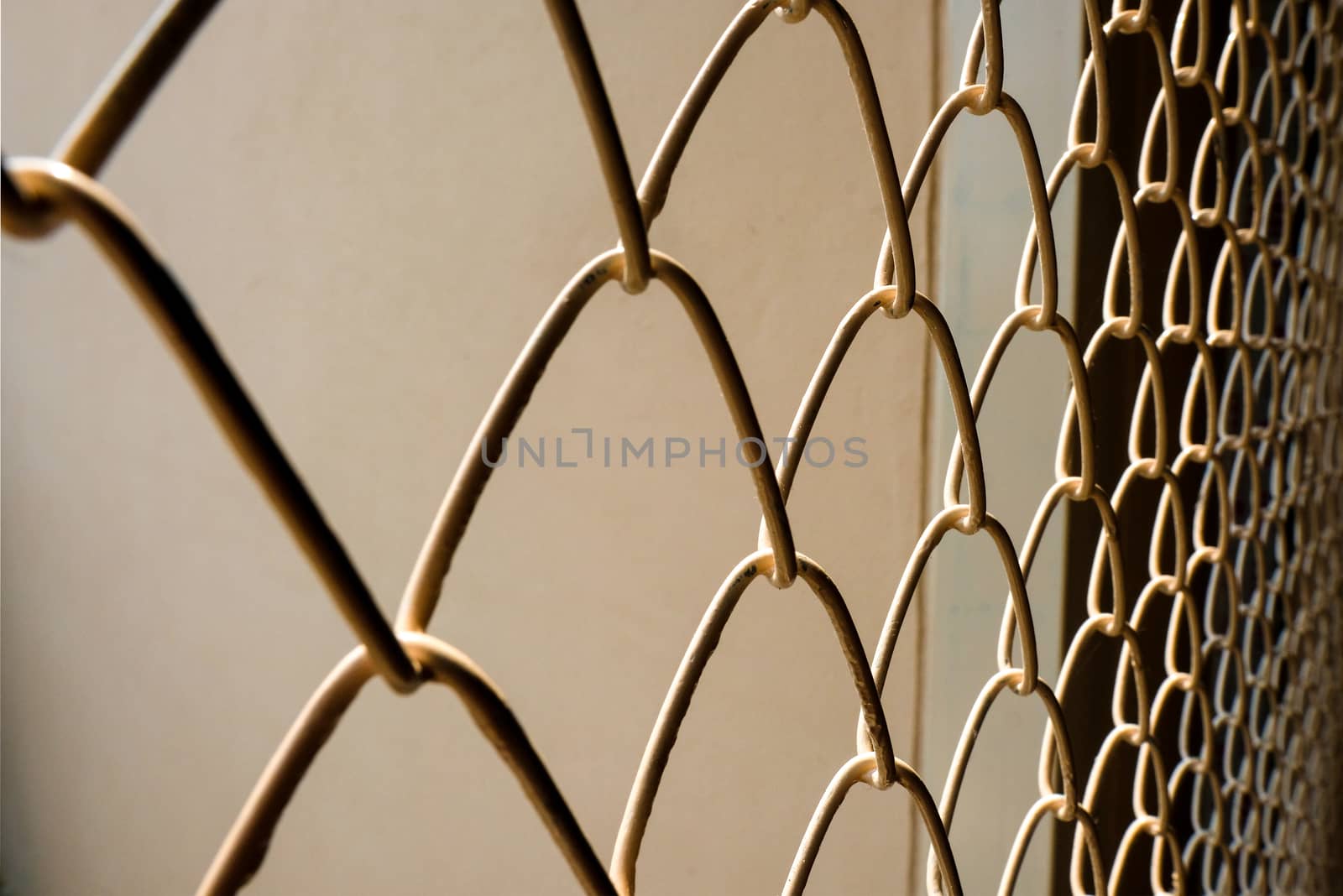 fence wiring, metal wire barrier with repeated patterns and leading lines: security, freedom concepts