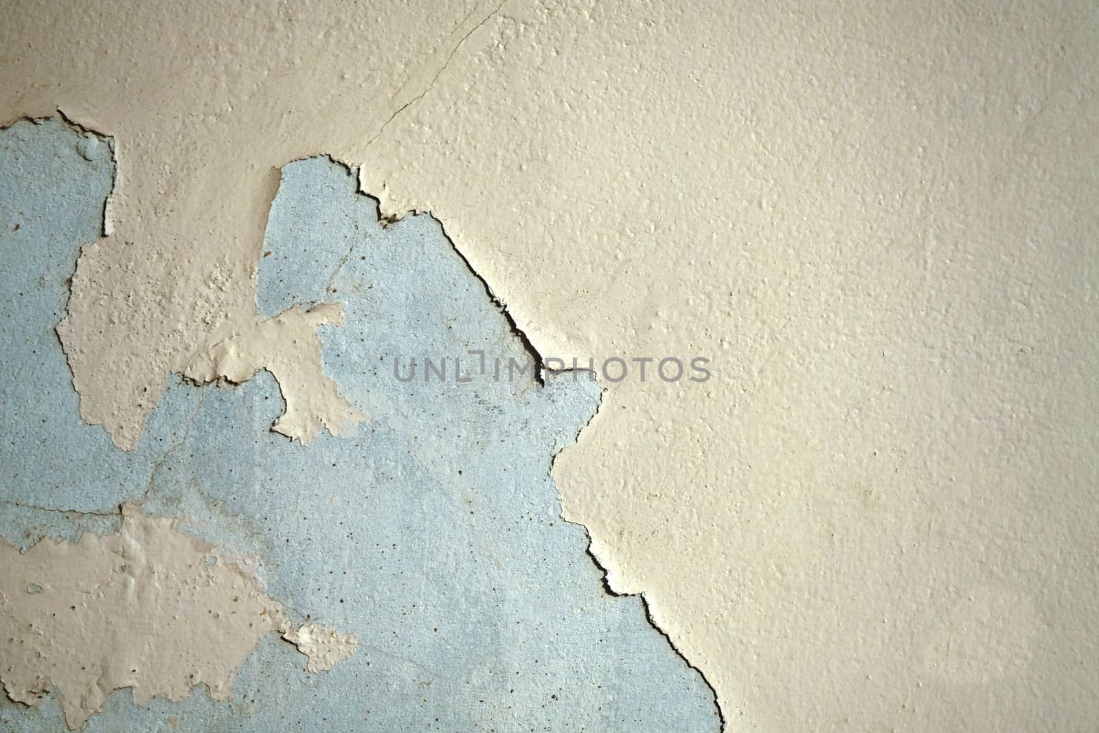 chipped paint on cream color concreat background