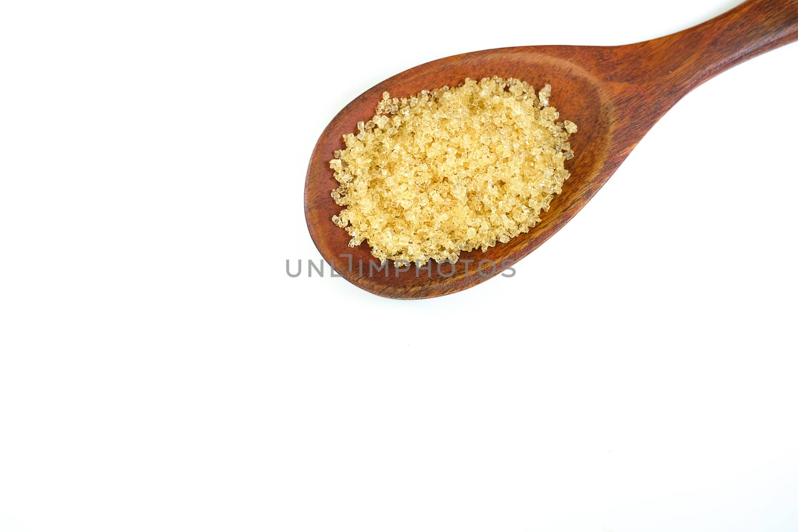 brown sugar and a wooden spoon, isolated on white background