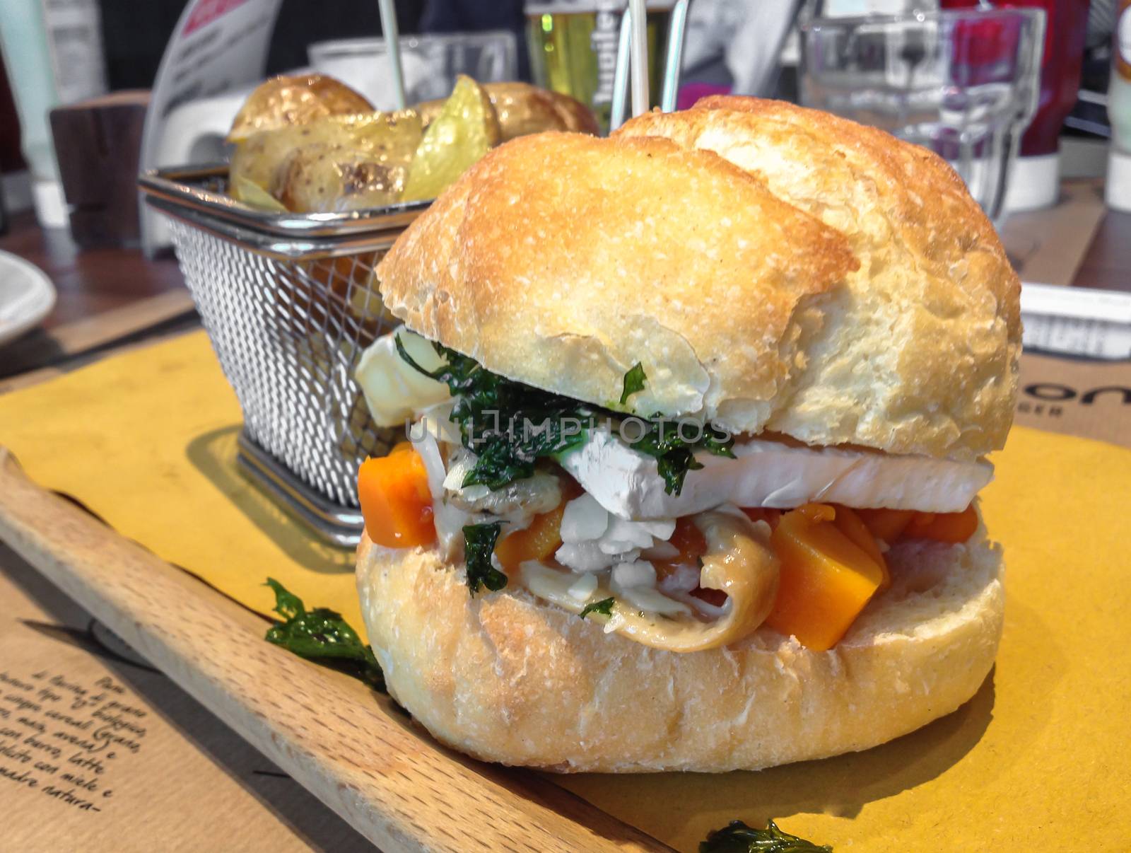 Vegetarian Sandwich served with baked potatoes on a wooden tray. Healthy lifestyle