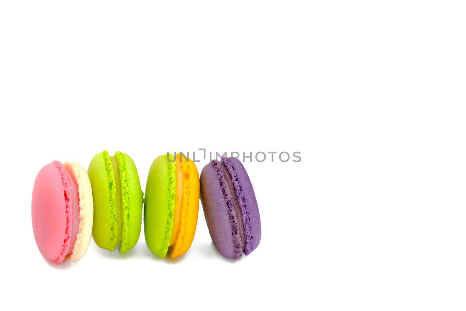assortments of colorful macaroons, isolated on white background