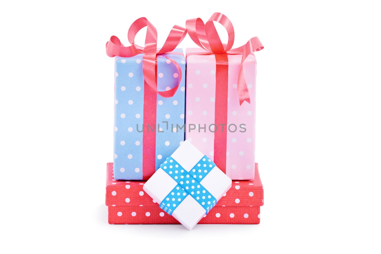 Pile of gifts, wrapped in cute wrapping paper and ribbons, isolated on white background. Christmas, New Year, anniversary, birthday, Valentine’s Day concept.
