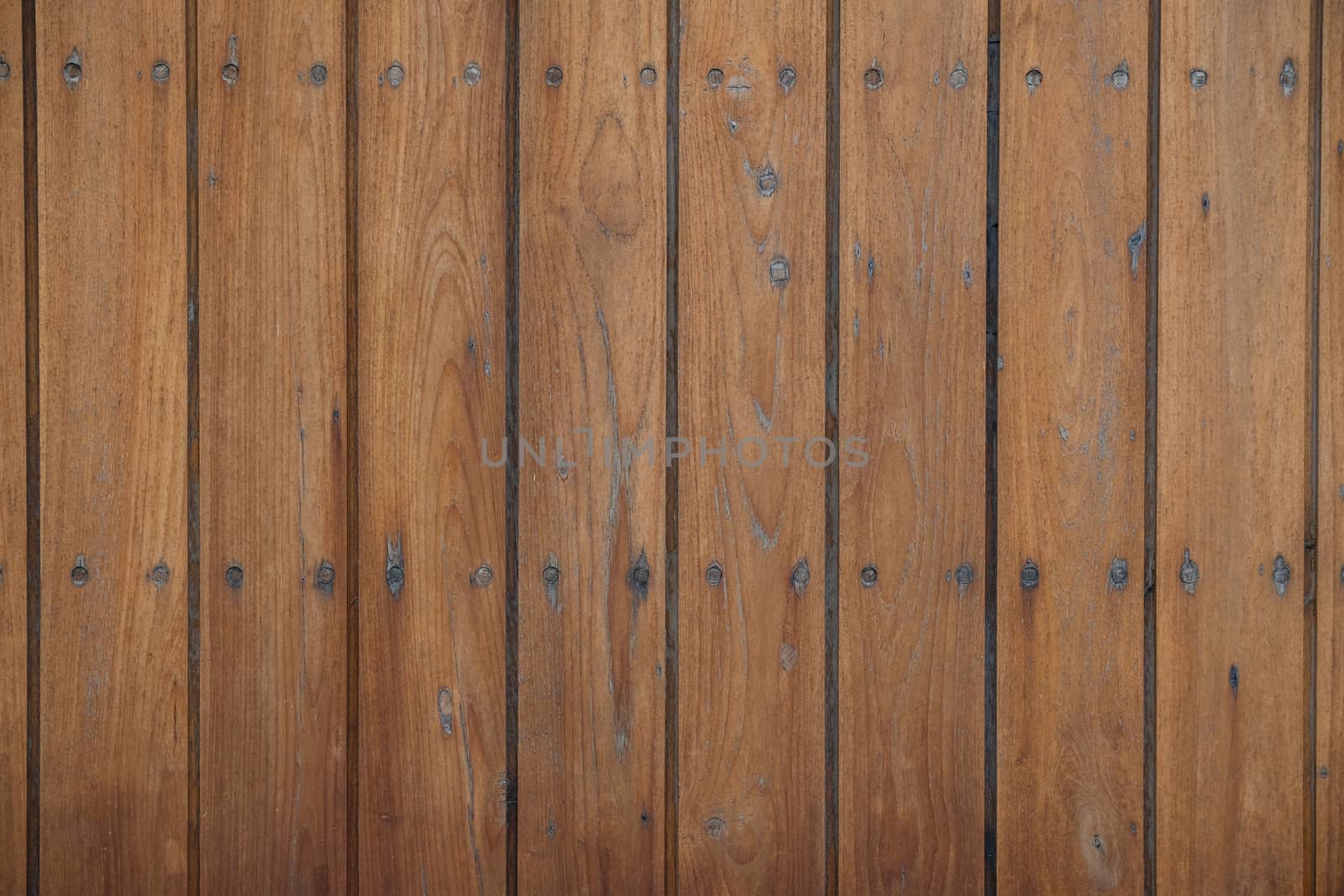 polished natural wood planks background with baeutiful grain pattern