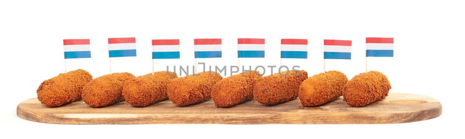 Brown crusty dutch kroketten on a serving tray isolated  by michaklootwijk
