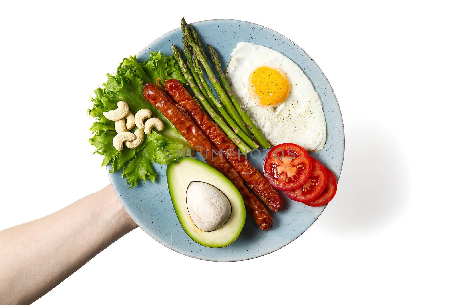 Healthy homemade breakfast with asparagus, fried egg and arugula. quarantine healthy eating concept. keto diet. by PhotoTime