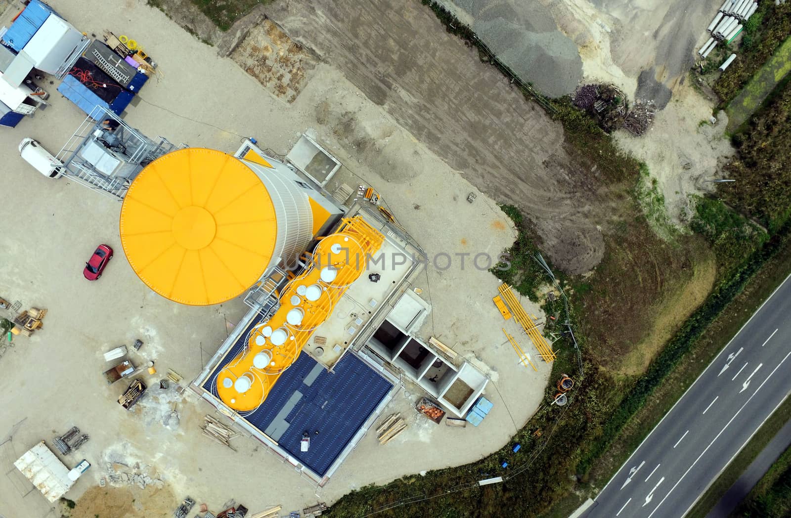 Aerial view of the construction site for a new concrete plant, taken with the drone from a height of seventy meters.