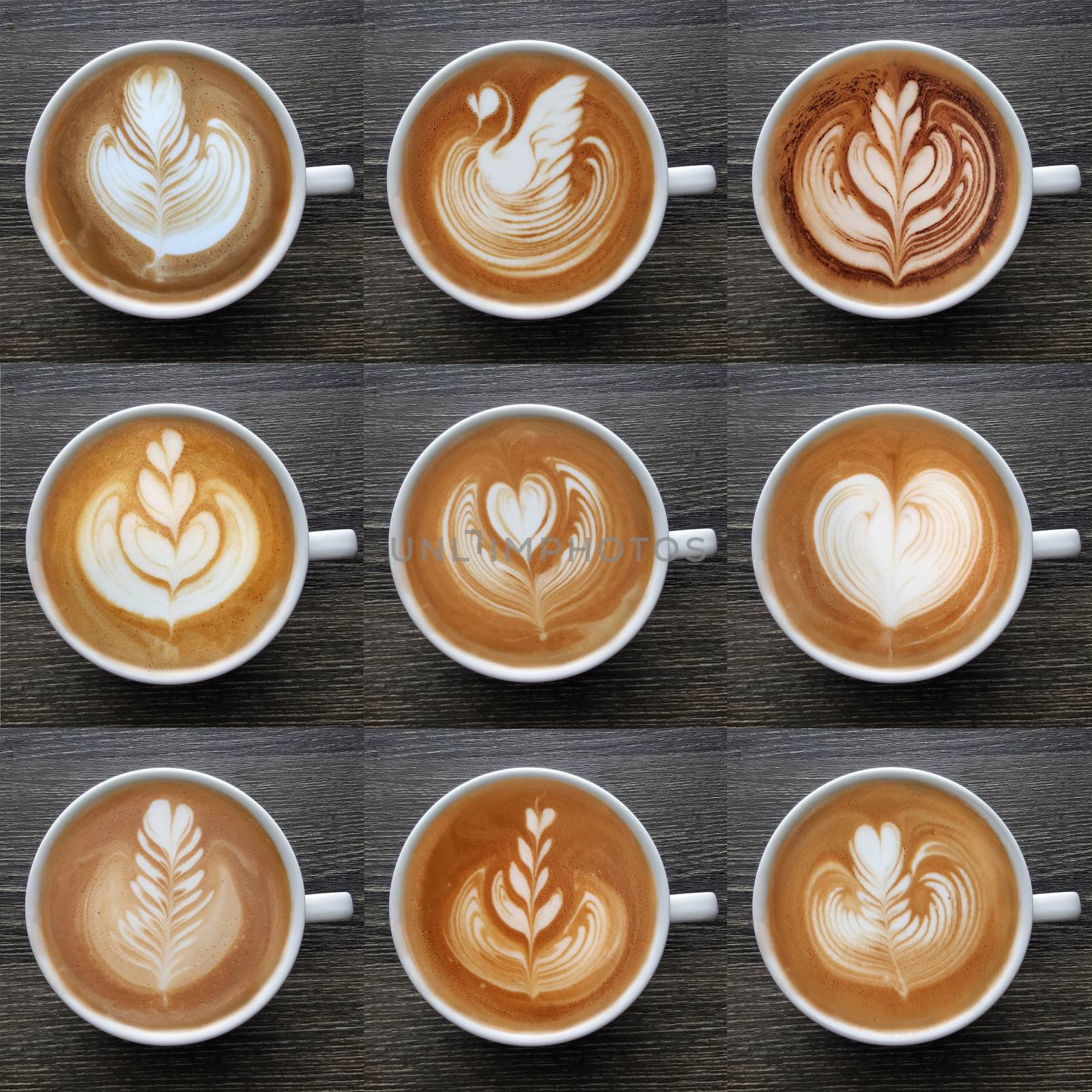 Collection of top view of latte art coffee mugs on timber background. by Tanarch