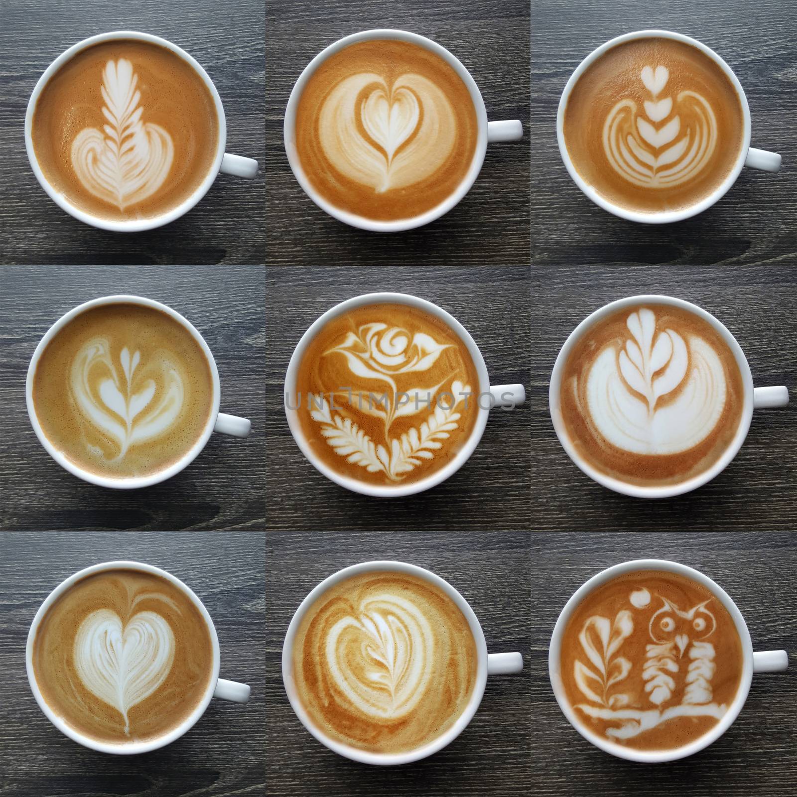 Collection of top view of latte art coffee mugs on timber background. by Tanarch