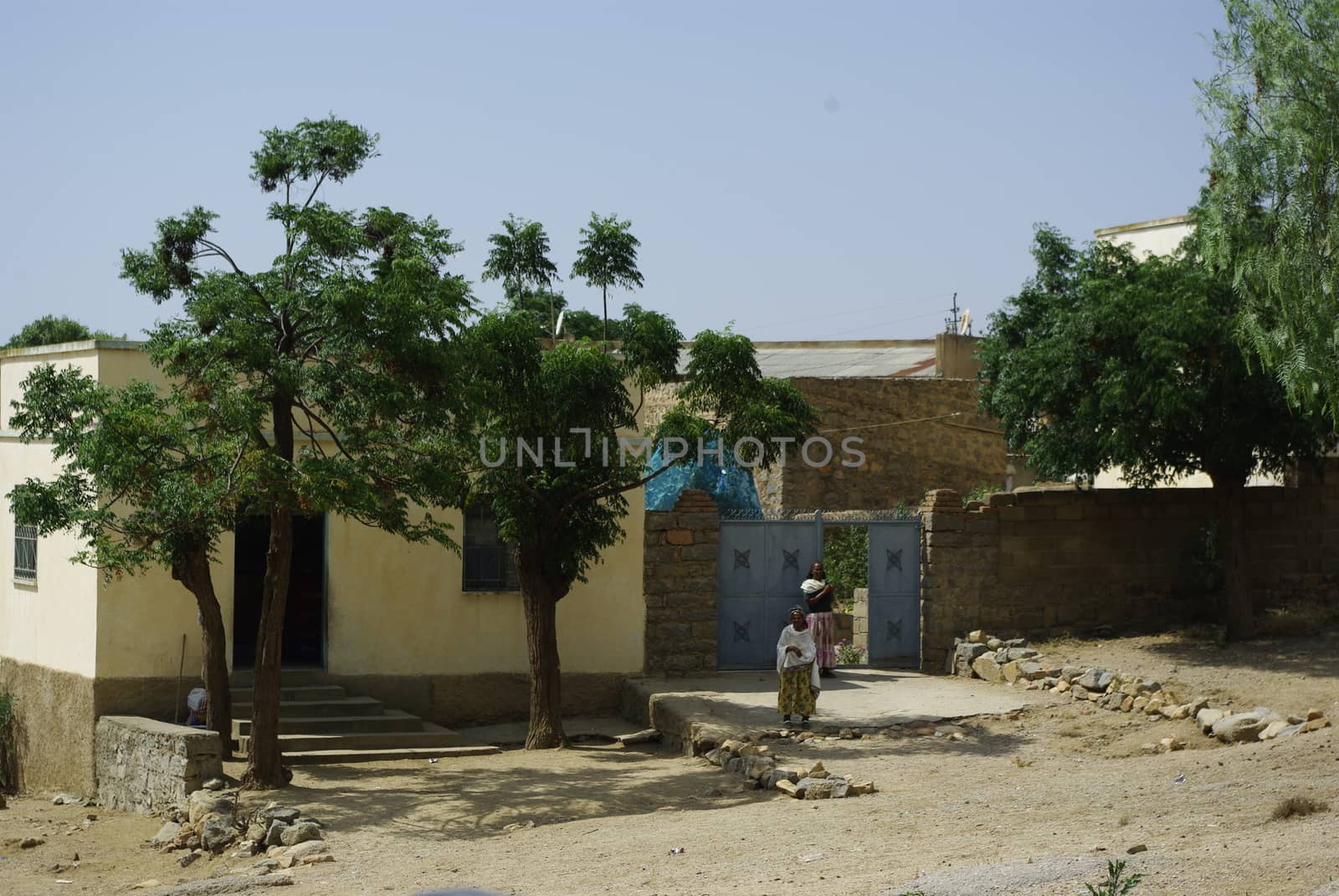 Eritrea, Africa - 08/10/2019: Travelling around the vilages near Asmara and Massawa. An amazing caption of the trees, mountains and some old typical houses with very hot climate in Eritrea.