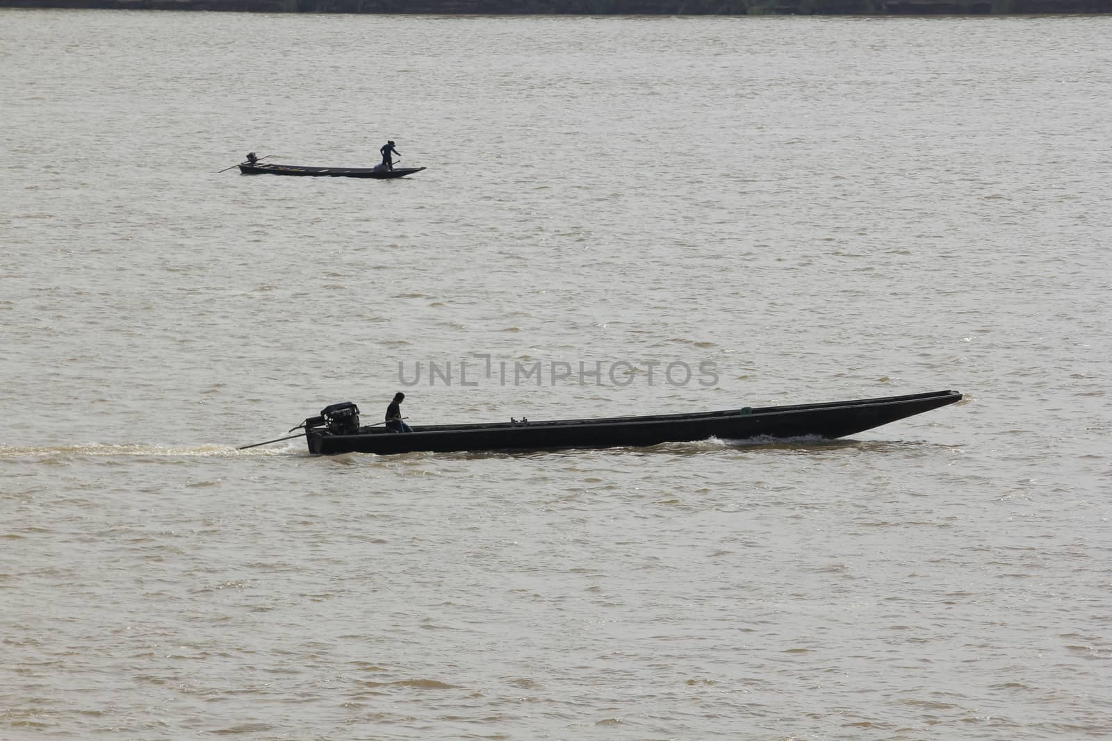 boat In the middle of the river by Puripatt