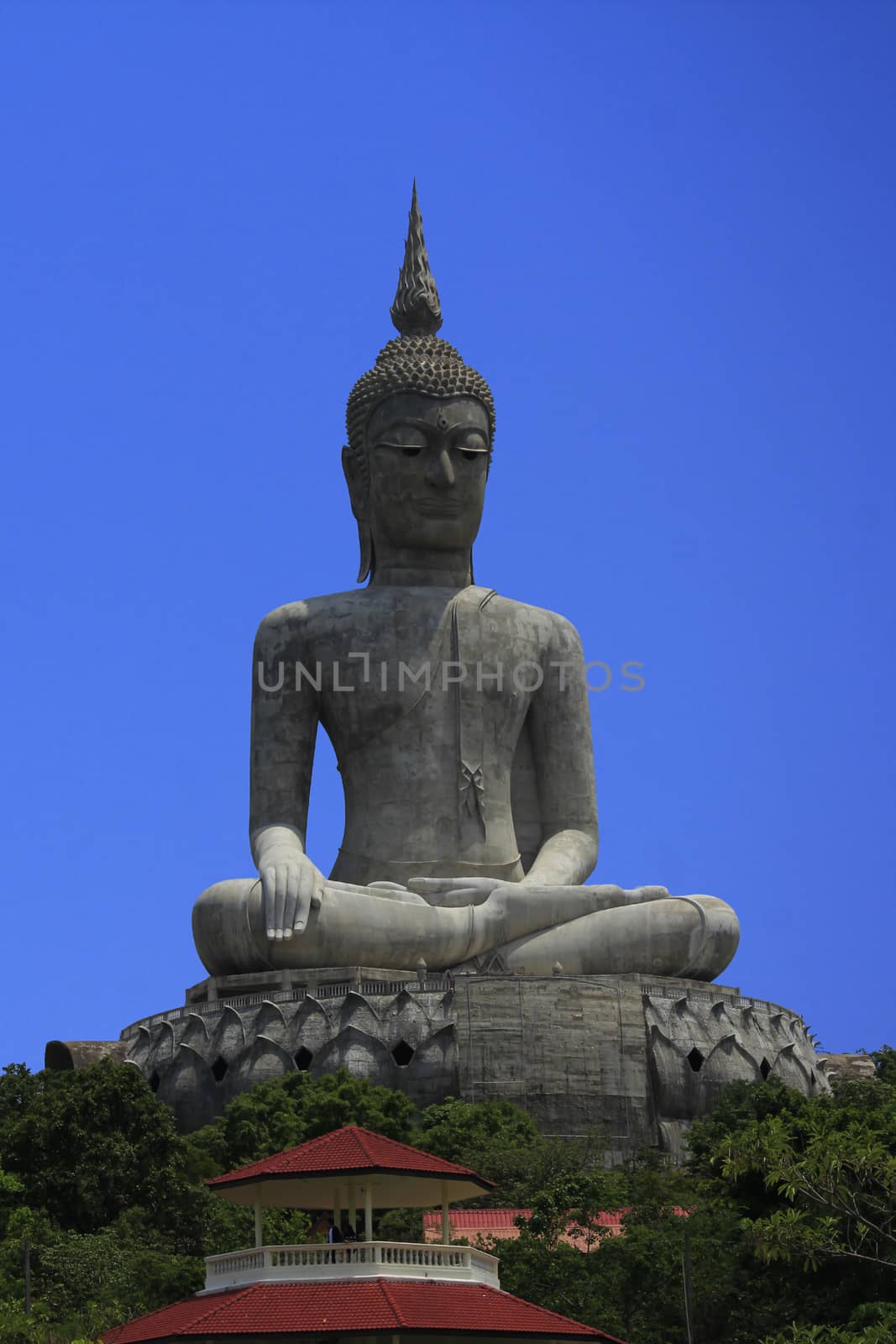 Large Buddha statue on a wide concrete base
