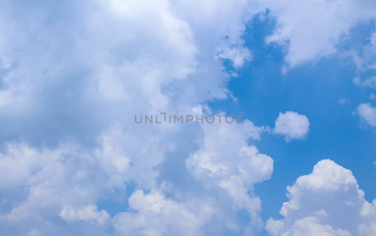 Bright sky and white clouds background.