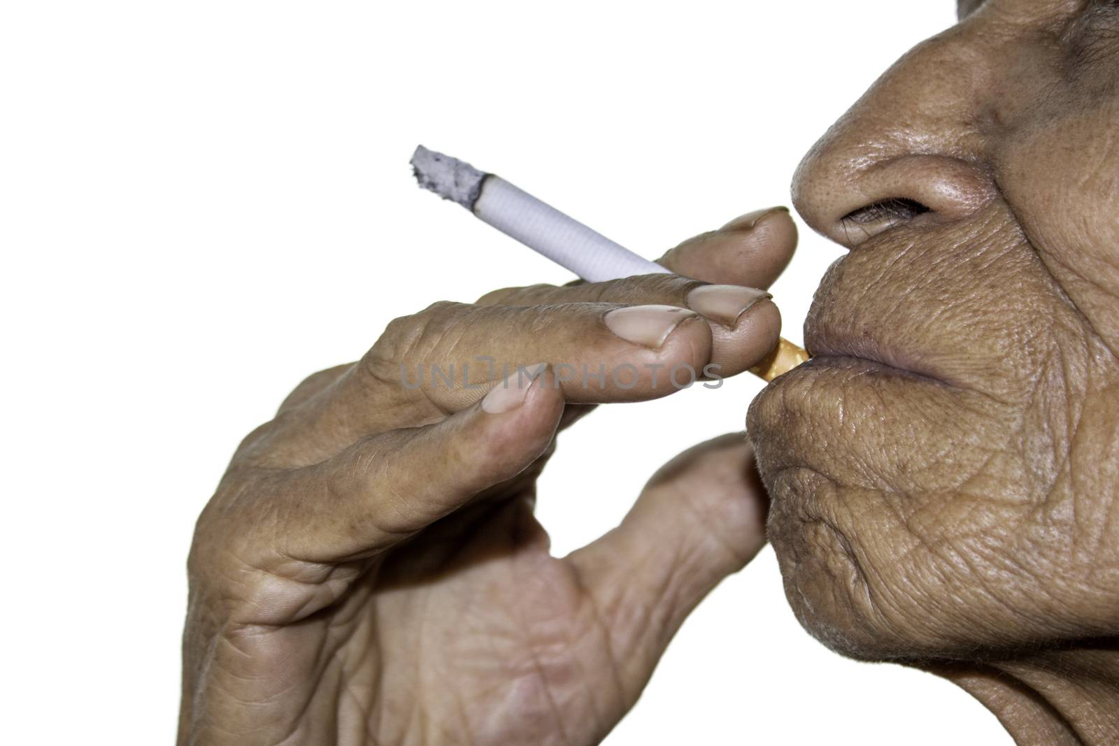World No Tobacco Day; Elderly Asian man is smoking isolated on white background with space for idea text.
