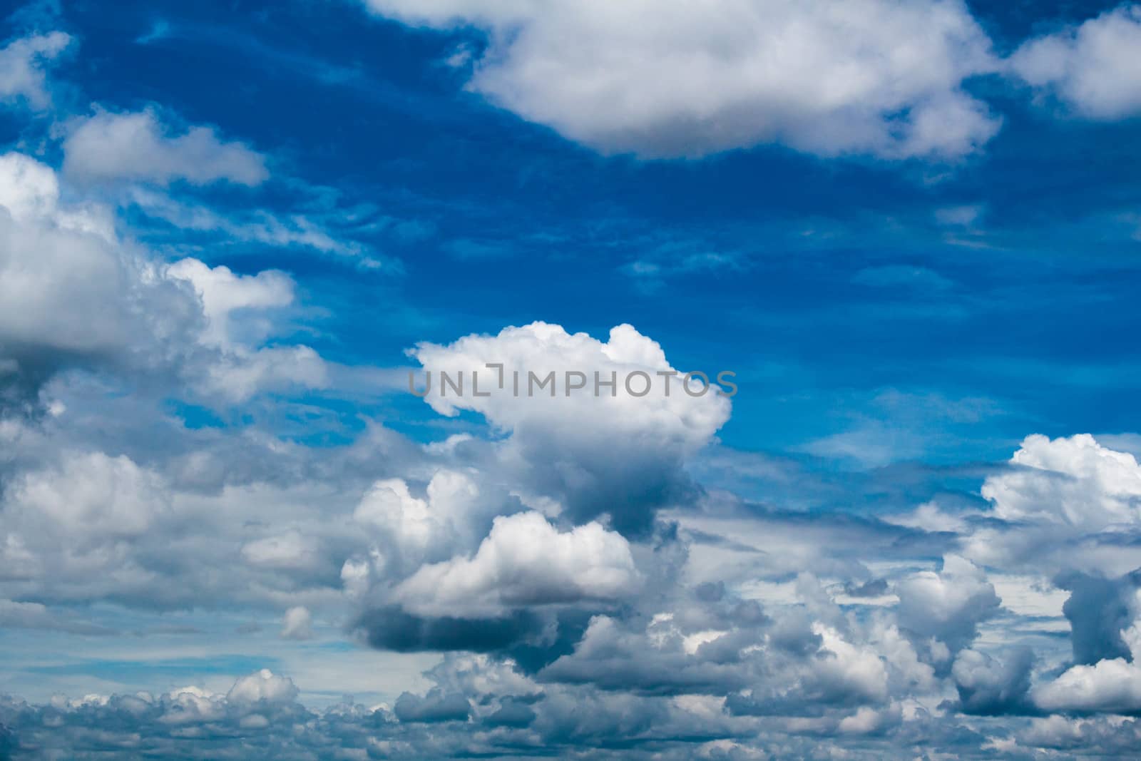 Blue sky with large cloud background. by TEERASAK