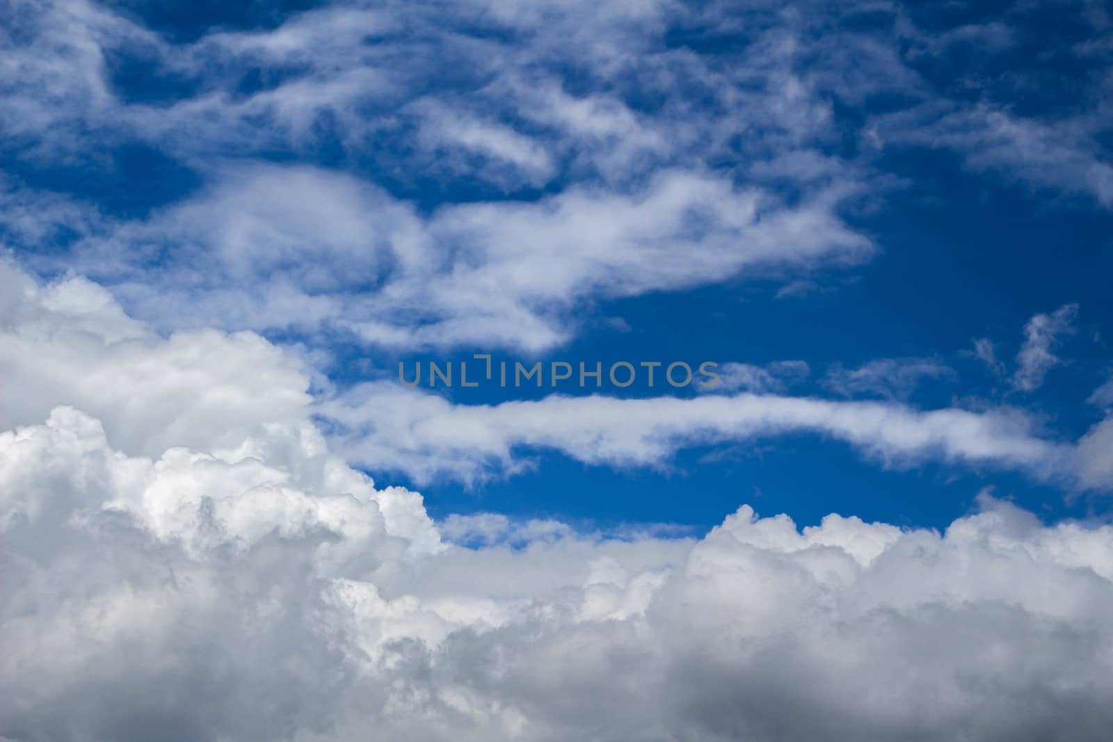 Blue sky with large cloud background. by TEERASAK