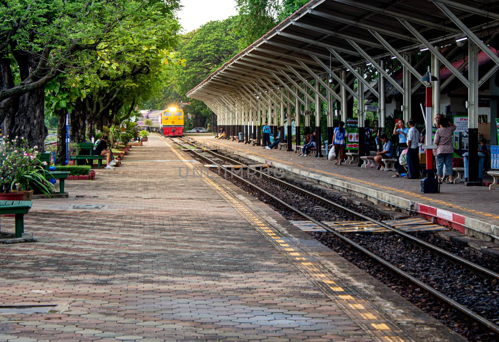 1 May 2019, Vintage diesel engine train is approaching the Lamphun station, Thailand. by TEERASAK