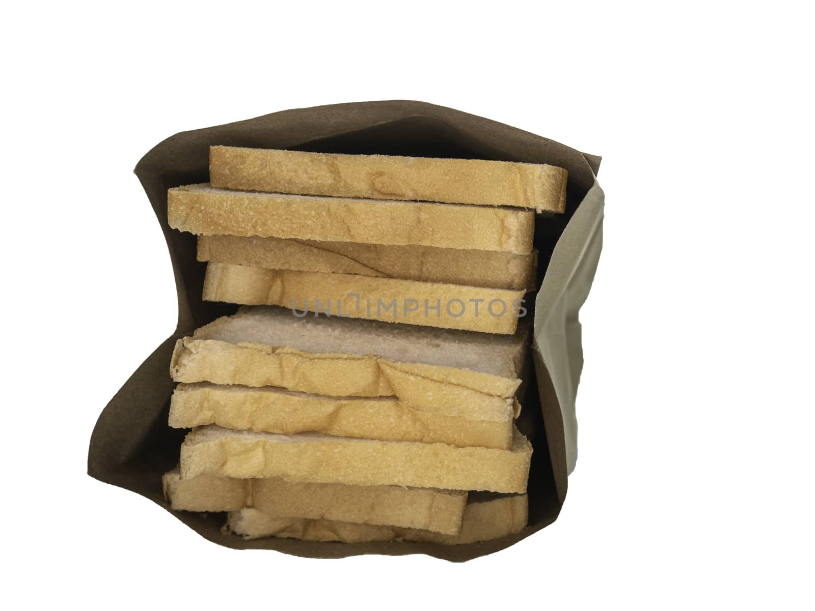 Bread full sliced in paper bag isolated on white background. by TEERASAK