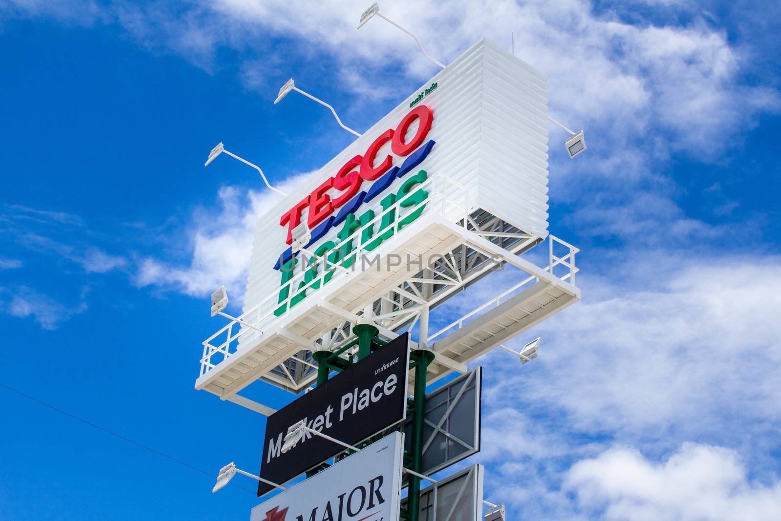 30 May 2019, The sign of shopping mall on blue sky and large clouds background in Chom Thong District; Chiang Mai, Thailand. Take a picture at parking lot. by TEERASAK