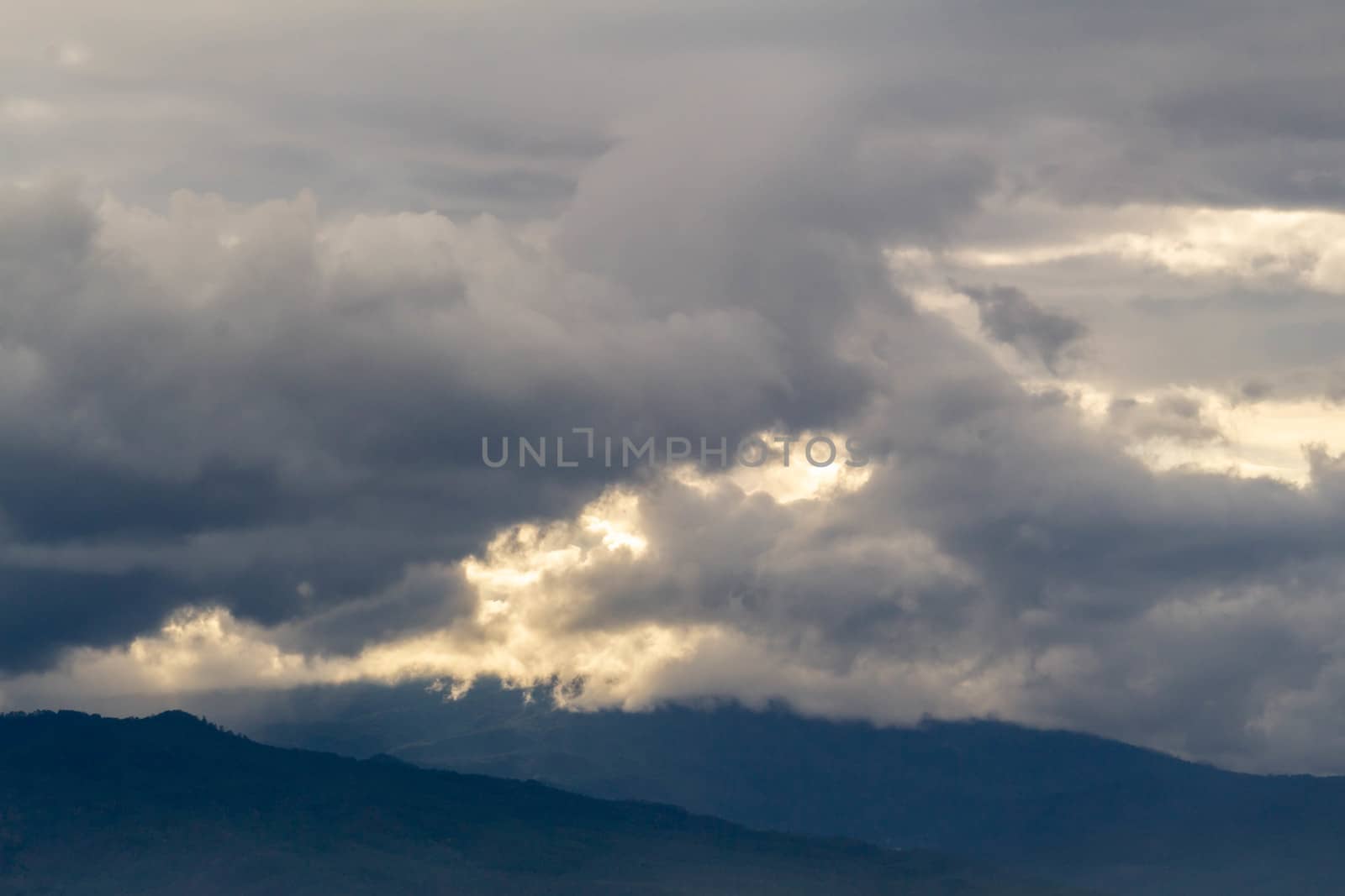 The Dark gray dramatic sky with large clouds in rainy seasons.