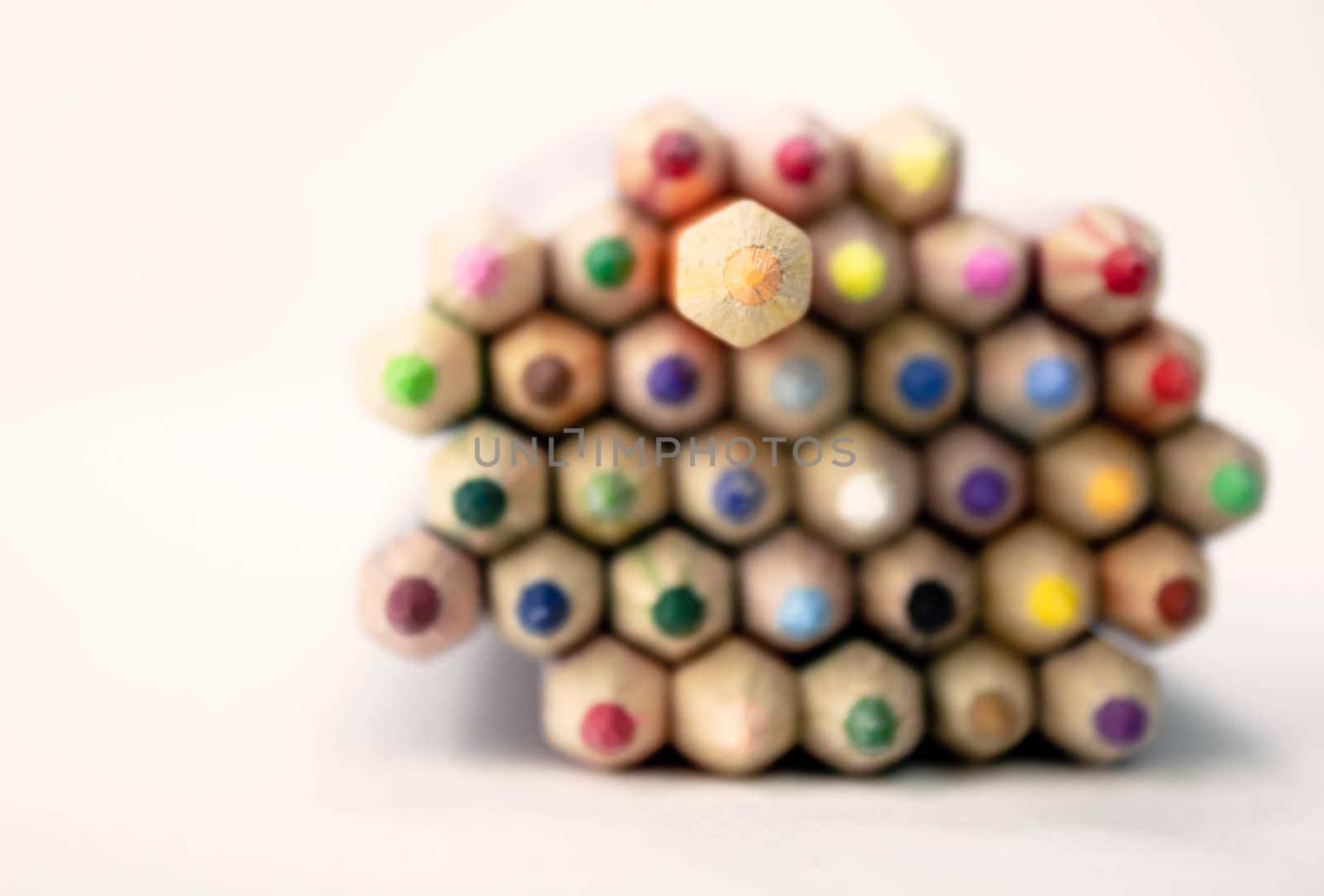 Color pencils isolated on white paper background with copy spaces. Education frame concept. Select focus. by TEERASAK