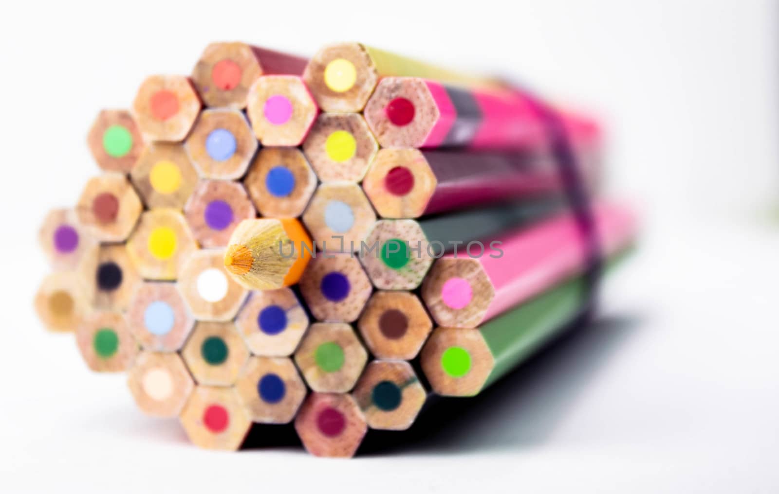 Color pencils isolated on white paper background with copy spaces. Education frame concept. Select focus. by TEERASAK