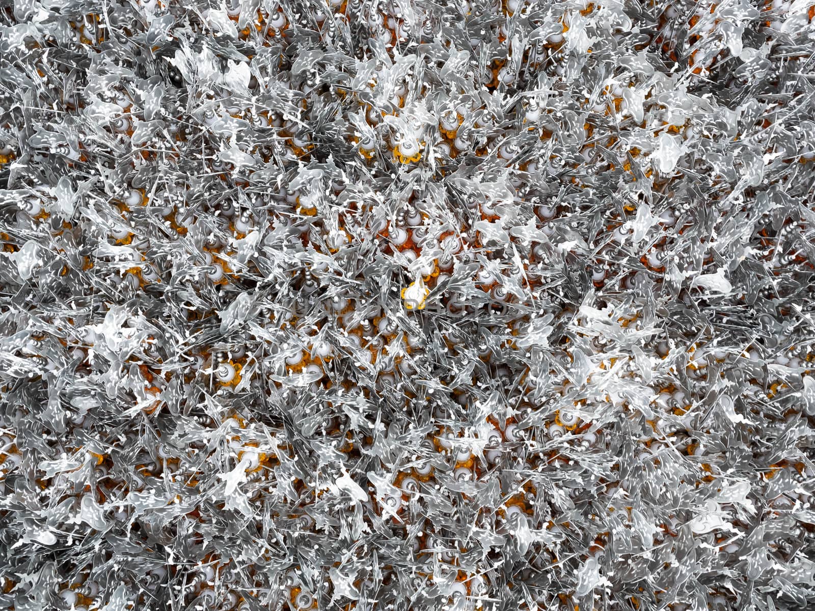 Wat Rong Khun (White Temple), Beautiful famous white temple located in Chiang Rai northern Thailand. Close-up of Many Silver Bodhi leaf hanging on the ceiling.