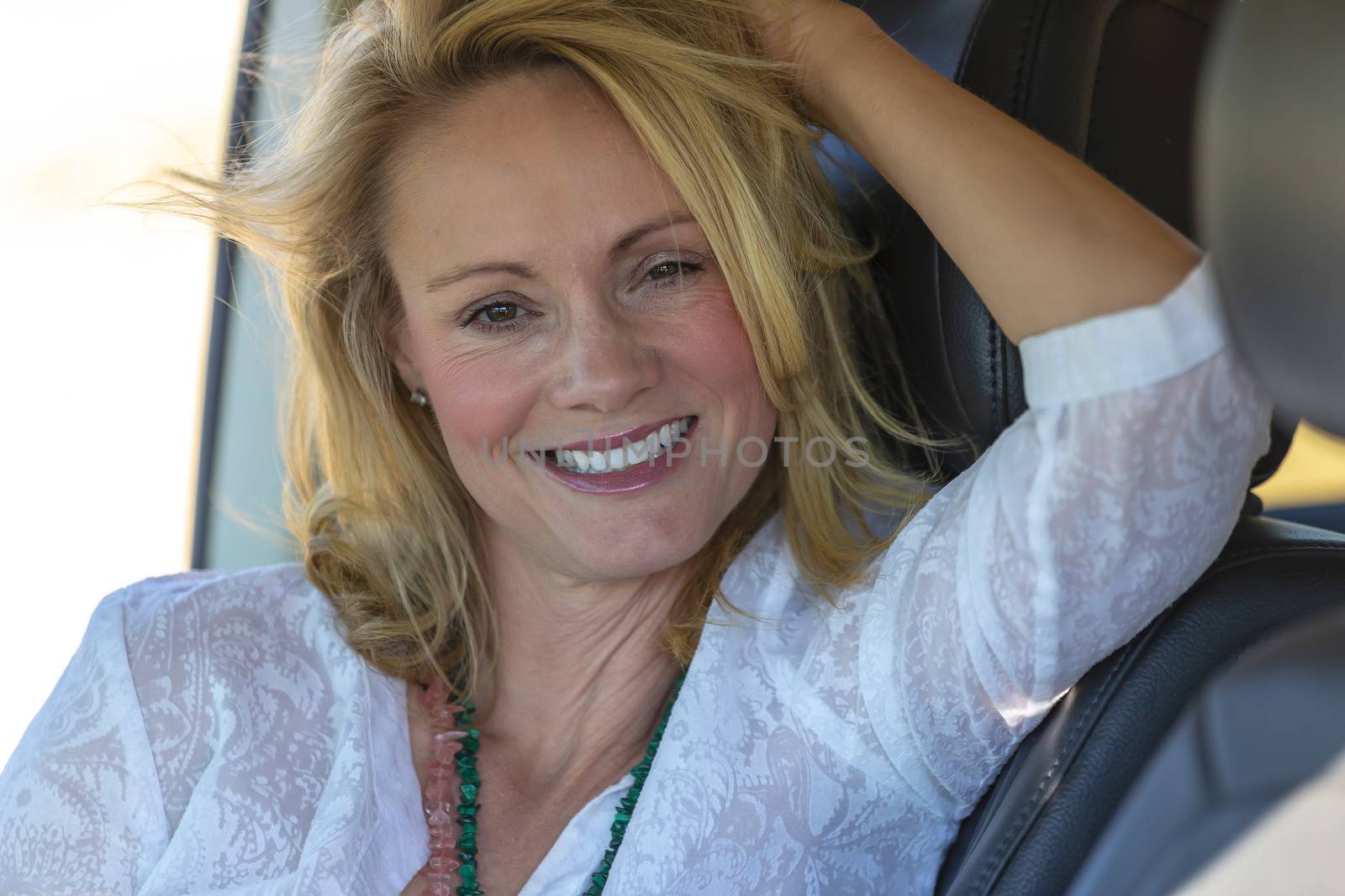 A gorgeous blonde model enjoys a spring day outdoors in the American Southwest