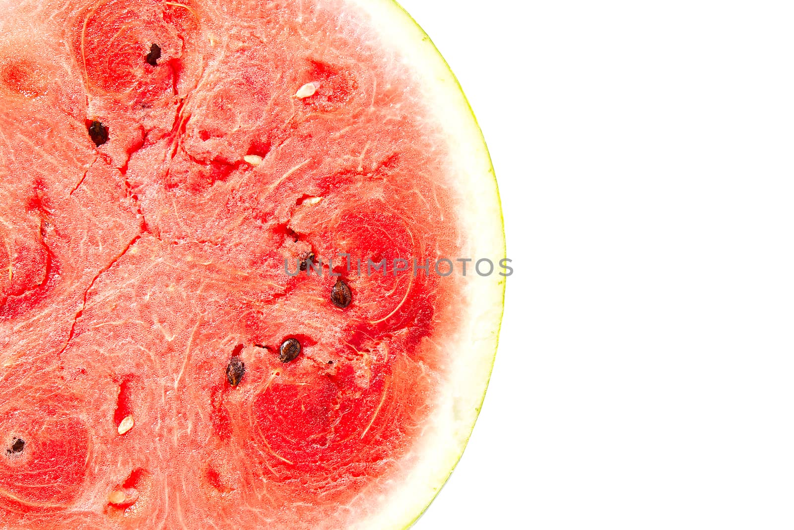 Sliced half of Fresh organic watermelon with red texture. close-up. Juicy, ripe, sweet watermelon isolated on white with copy space